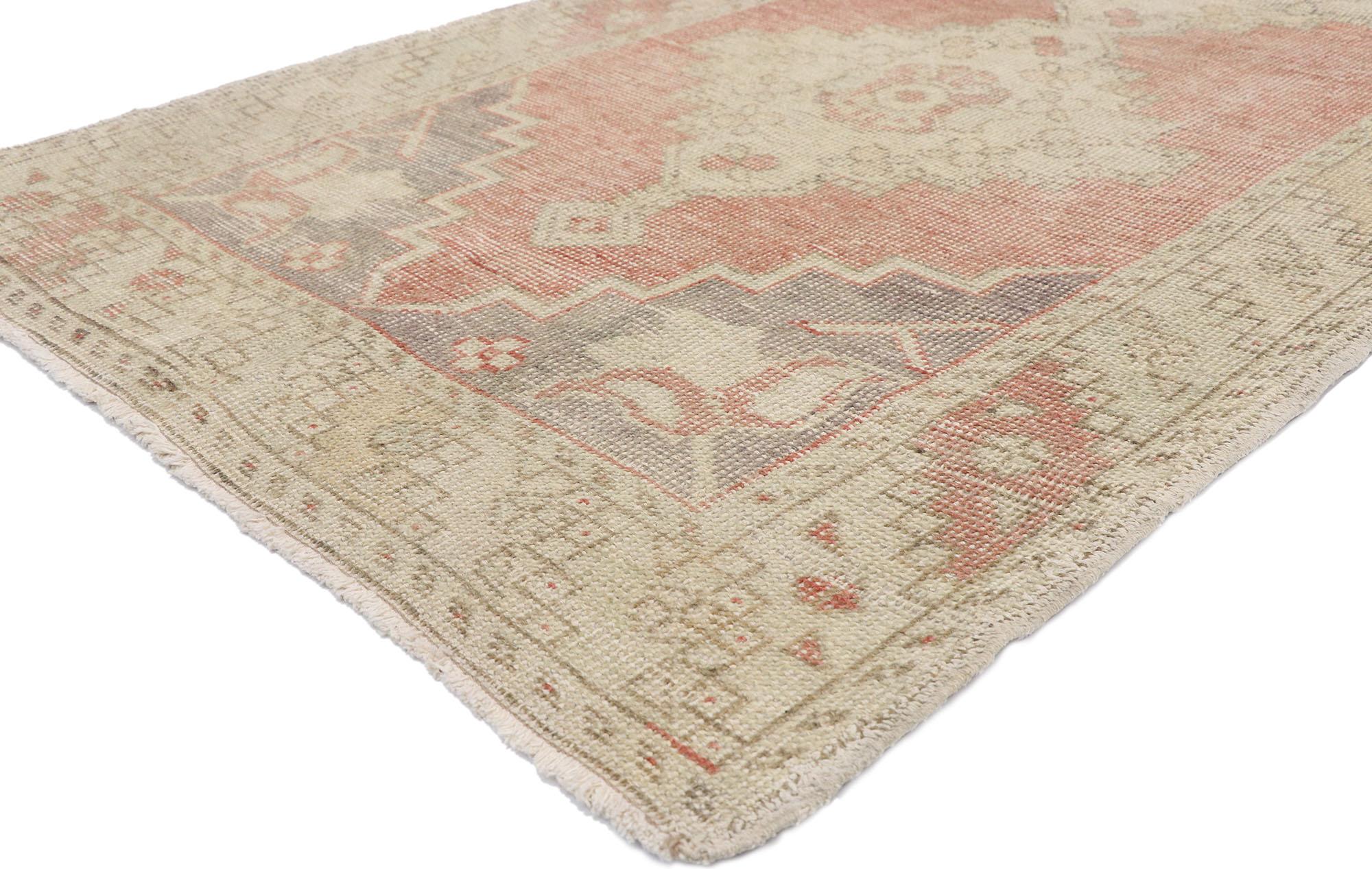 52721, distressed vintage Turkish Oushak runner with romantic rustic style 03'04 x 10'03. A beautiful combination of warm tones and light hues, this hand knotted wool distressed vintage Turkish Oushak runner charms with ease. It features four