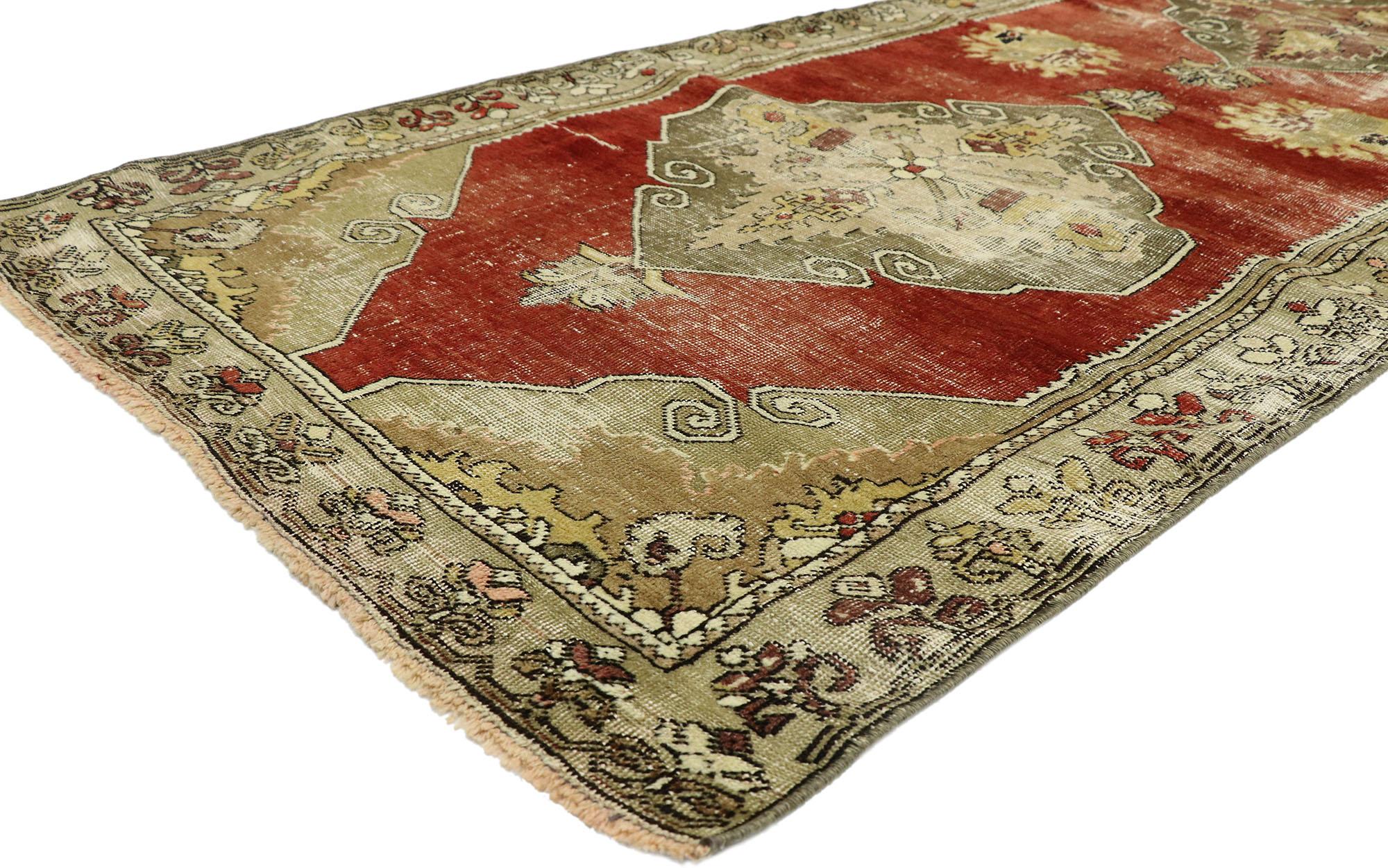 52772, distressed vintage Turkish Oushak runner with rustic lodge style. This hand knotted wool vintage Turkish Oushak runner features three large medallions anchored with palmette pendants spread across an abrashed brick red field dotted with four
