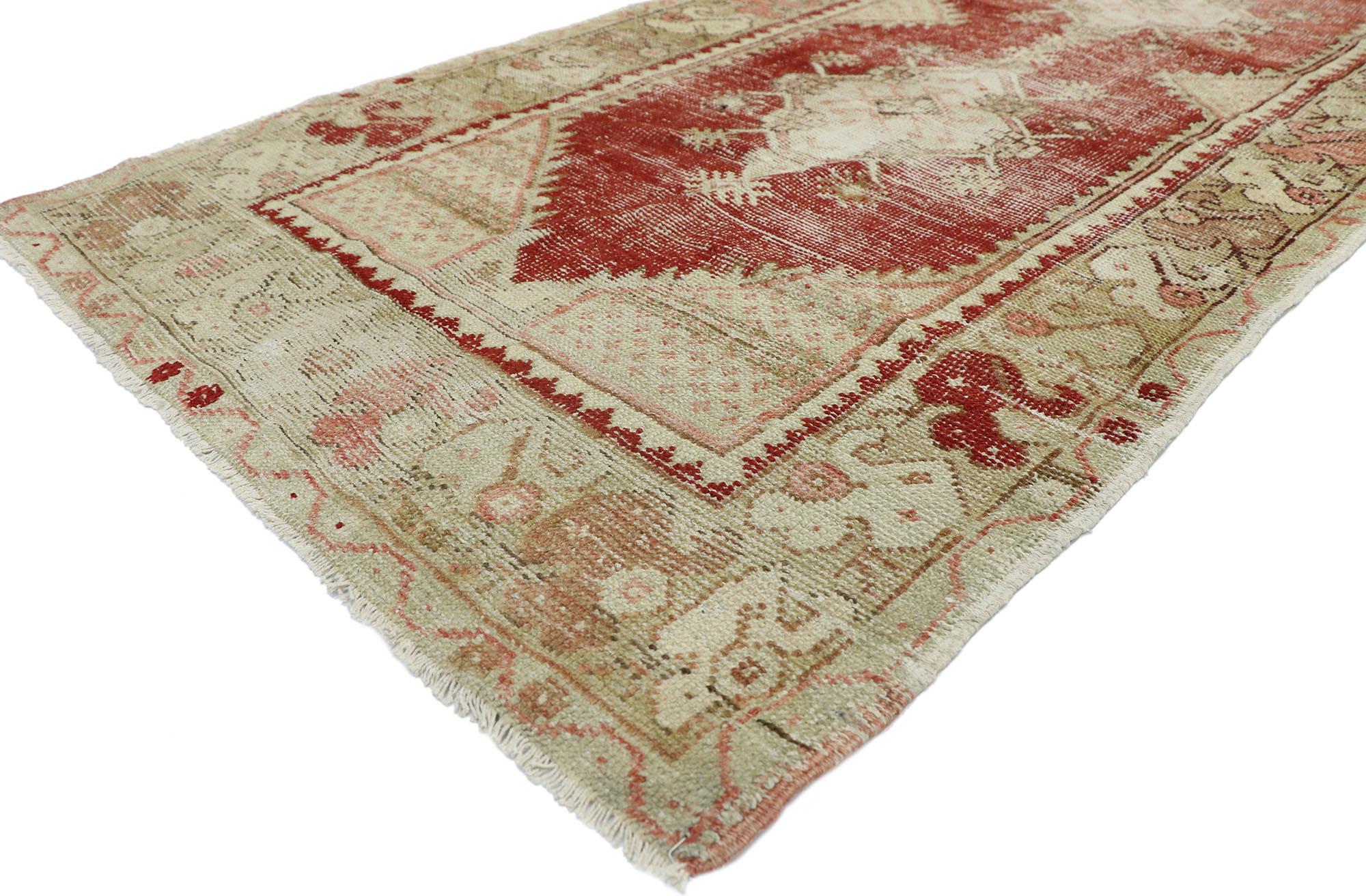 52719, distressed Vintage Turkish Oushak runner with Rustic neoclassical style. Romantic Rusticity meets timeless Anatolian tradition in this shabby chic neoclassical style hallway runner. This hand knotted wool distressed vintage Turkish Oushak