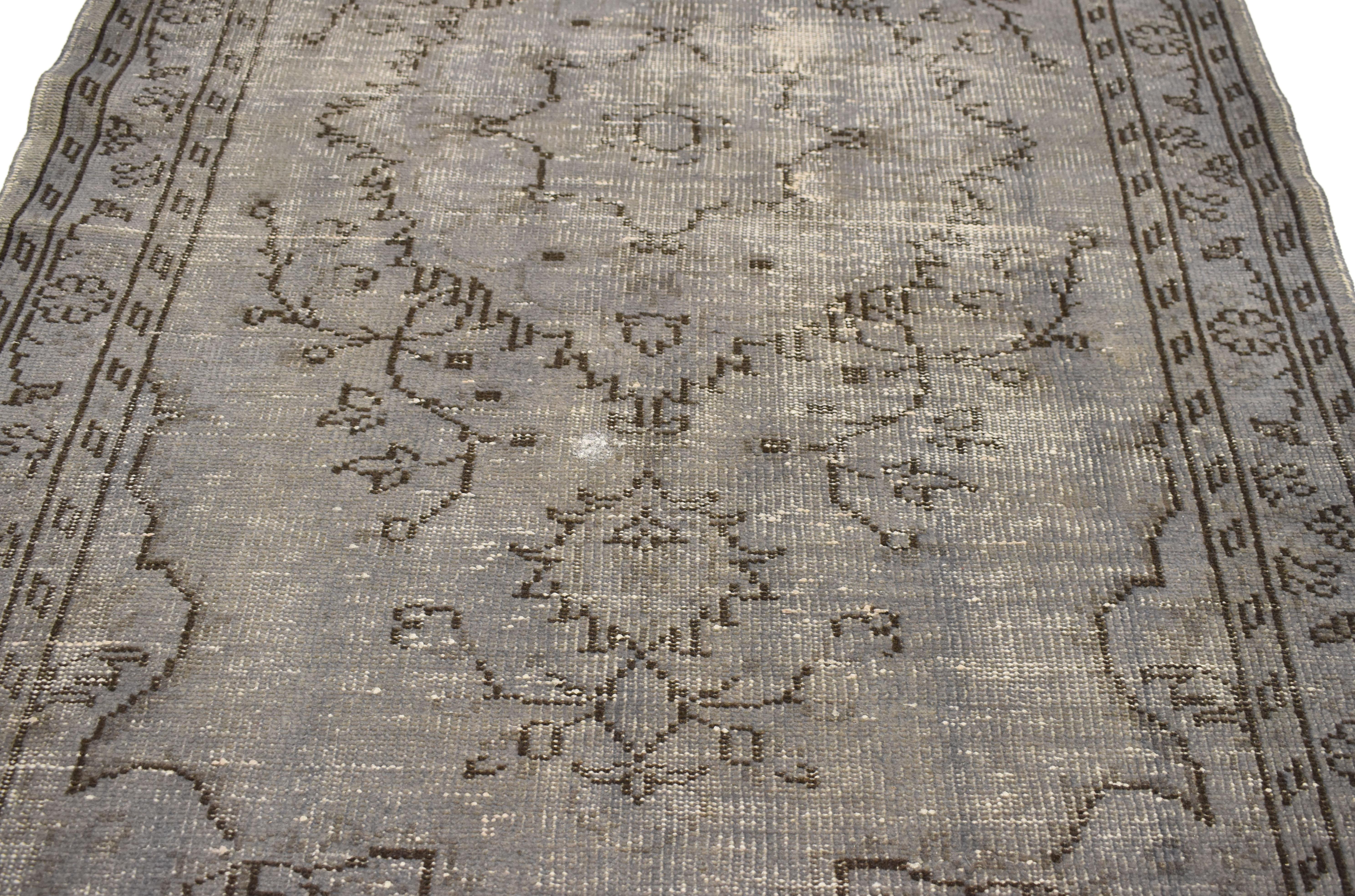 20th Century Distressed Vintage Turkish Overdyed Gray Rug with Feminine Industrial Style For Sale