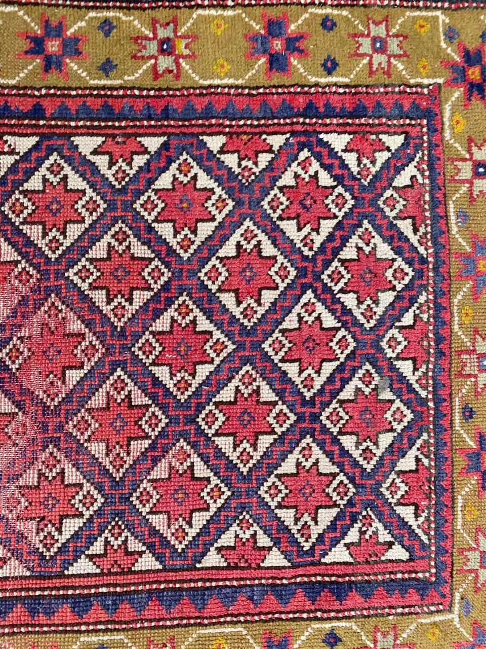 Distressed Vintage Turkish Rug In Fair Condition For Sale In Saint Ouen, FR