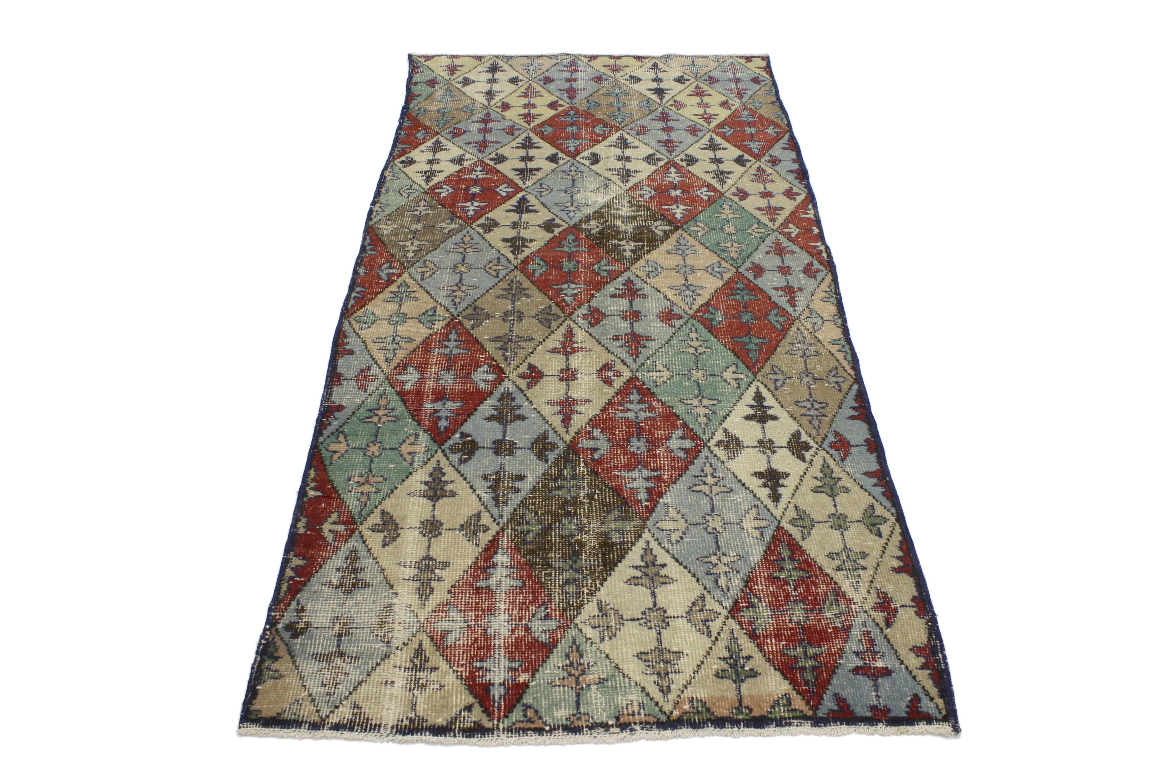 51930, distressed vintage Turkish Sivas rug with Industrial Art Deco style. This distressed vintage Turkish Sivas rug with Industrial Art Deco style features an all-over lozenge pattern and each diamond is filled with a four petaled leaf. The