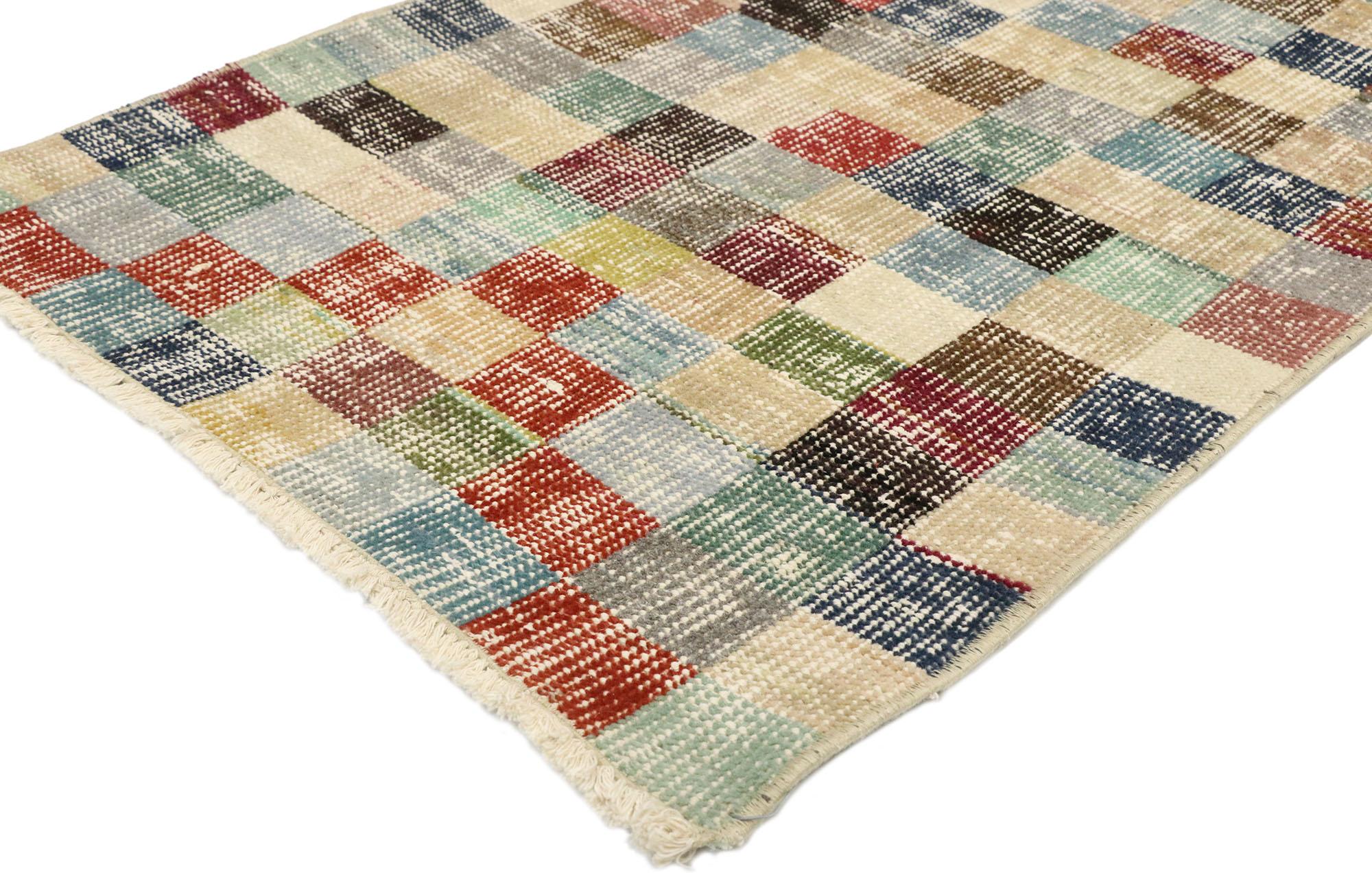 51895, Zeki Muren distressed vintage Turkish Sivas rug with Industrial Postmodern Cubism style. The versatility of this rug lies in its simple, colorful checkerboard design. Whether running along a hallway in an Amish style farmhouse or along a