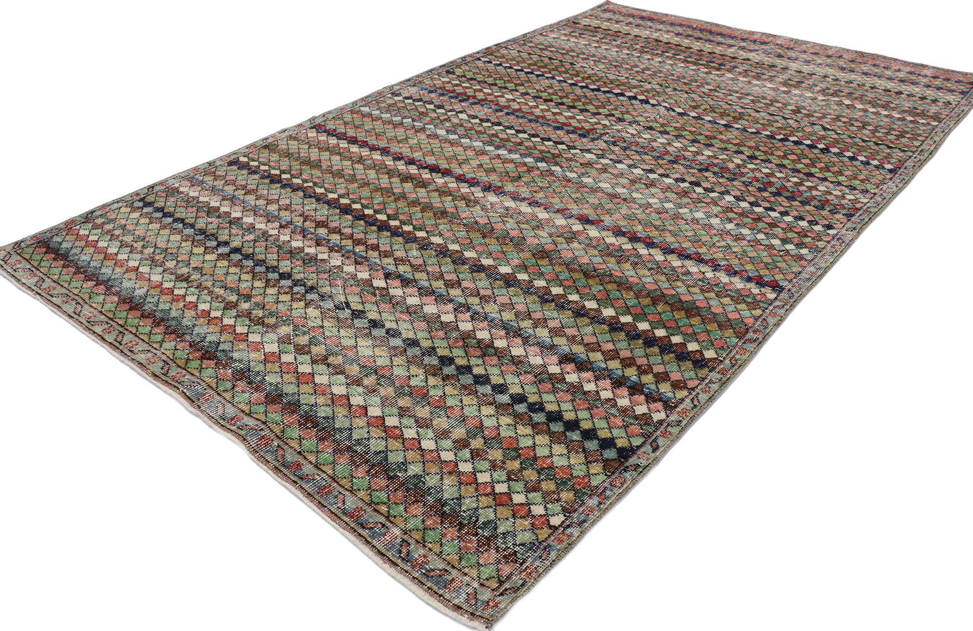 53289, distressed vintage Turkish Sivas rug with Mid-Century Modern Bohemian style. This hand knotted wool distressed vintage Turkish Sivas rug features an all-over checkered pattern comprised of rows of multicolored diamonds. Each row alternates