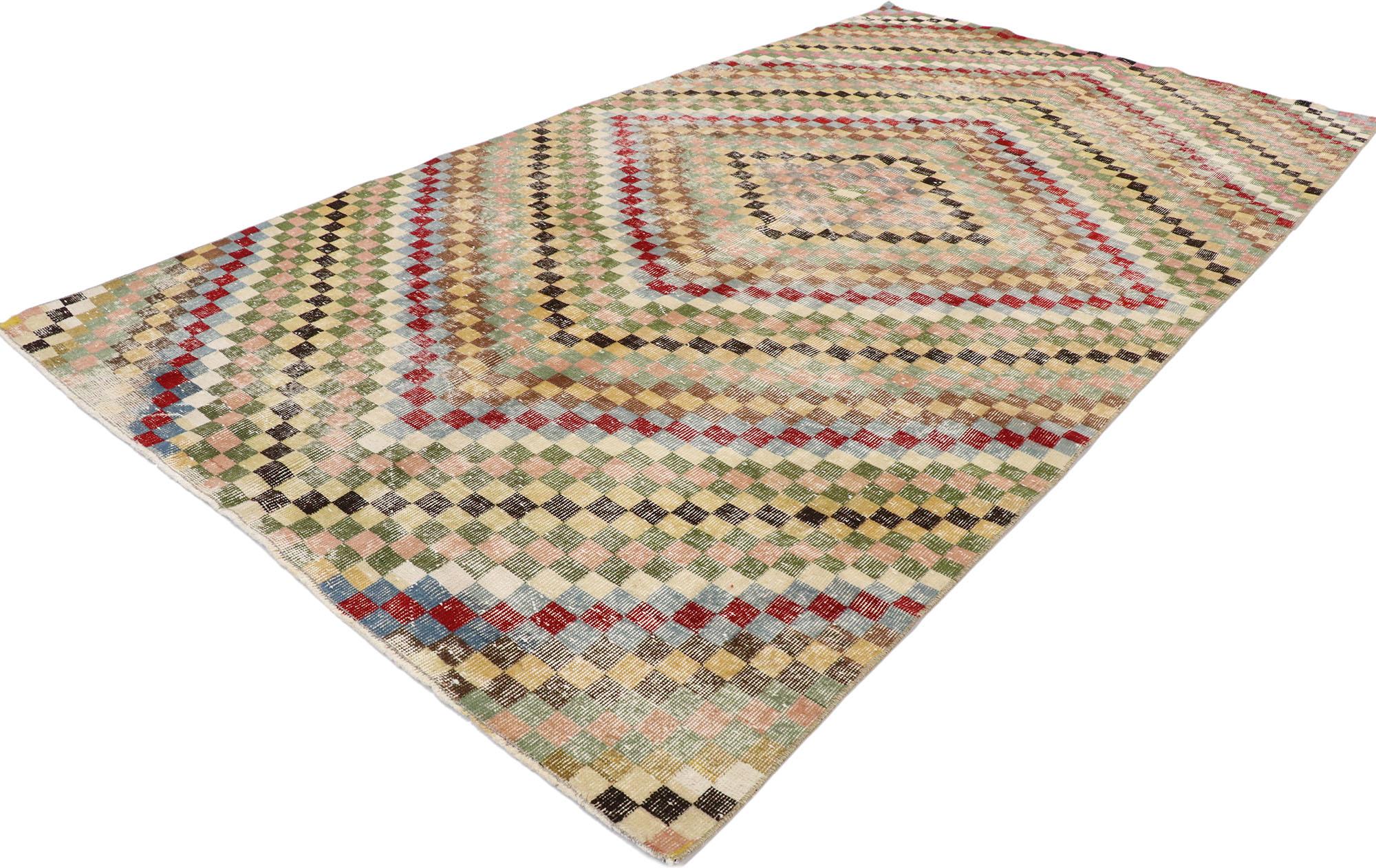 53376, Distressed Vintage Turkish Sivas Rug with Modern Cubist Style. This hand knotted wool distressed vintage Turkish Sivas rug features an all-over checkered pattern. Color-blocked concentric diamonds comprised of small cubes and squares radiate