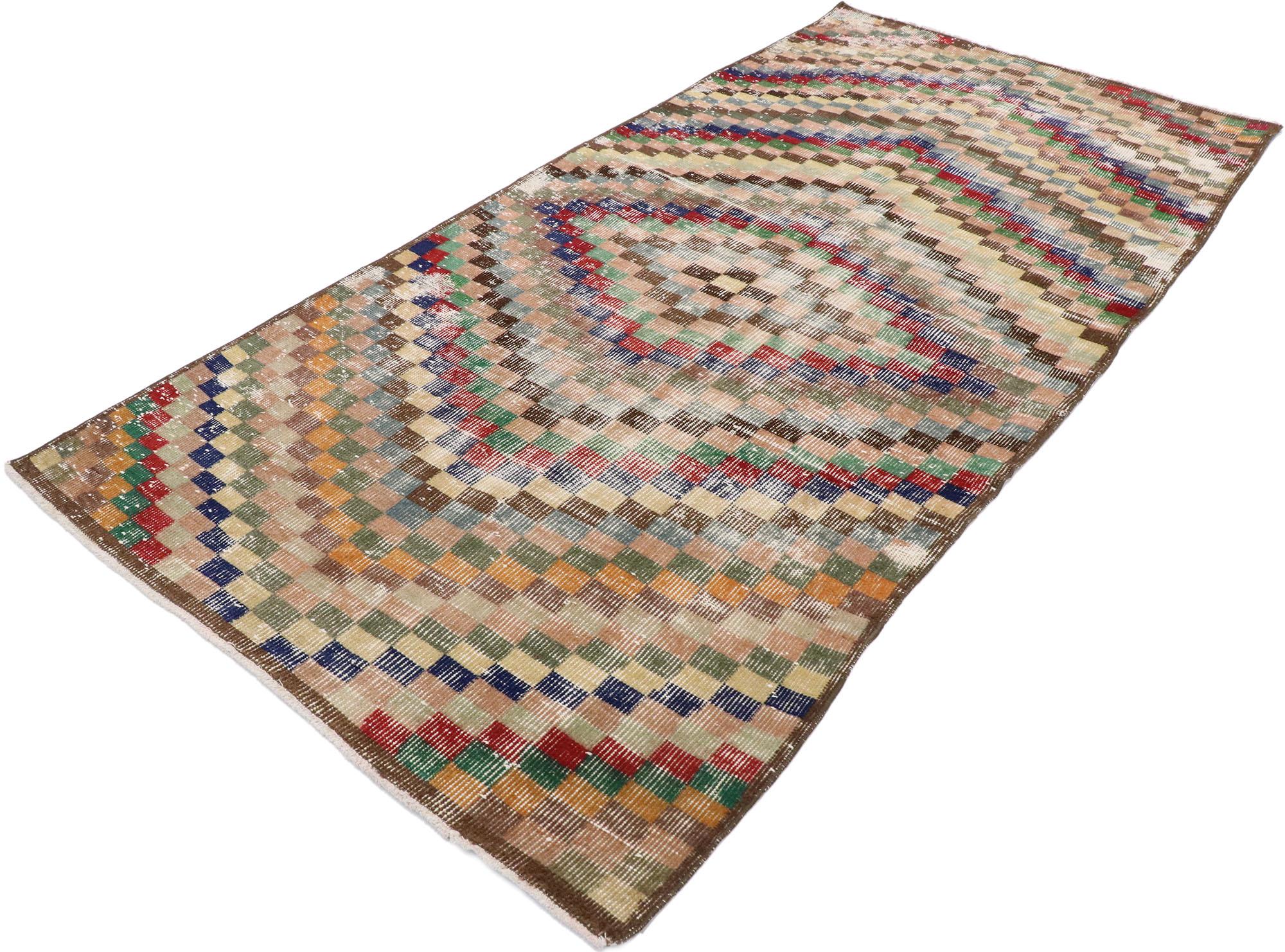 53354, Distressed Vintage Turkish Sivas Rug with Modern Cubist Style. This hand knotted wool distressed vintage Turkish Sivas rug features an all-over checkered pattern. Color-blocked concentric diamonds comprised of small cubes and squares radiate