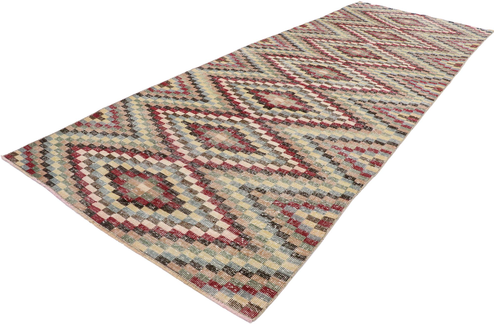 53367, distressed vintage Turkish Sivas rug with Modern Rustic Cubism style. This hand knotted wool distressed vintage Turkish Sivas runner features an all-over checkered stacked diamond pattern comprised of rows of multicolored cubes. Each row of