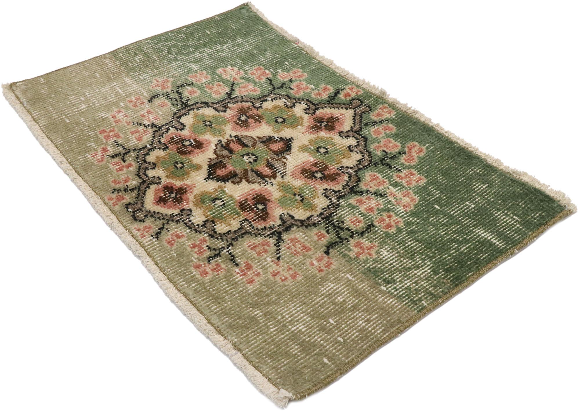 53313, distressed vintage Turkish Sivas rug with romantic English country cottage style. This hand knotted wool distressed vintage Turkish Sivas rug features a lovingly time-worn abrashed field festooned with a gorgeous floral botanical medallion