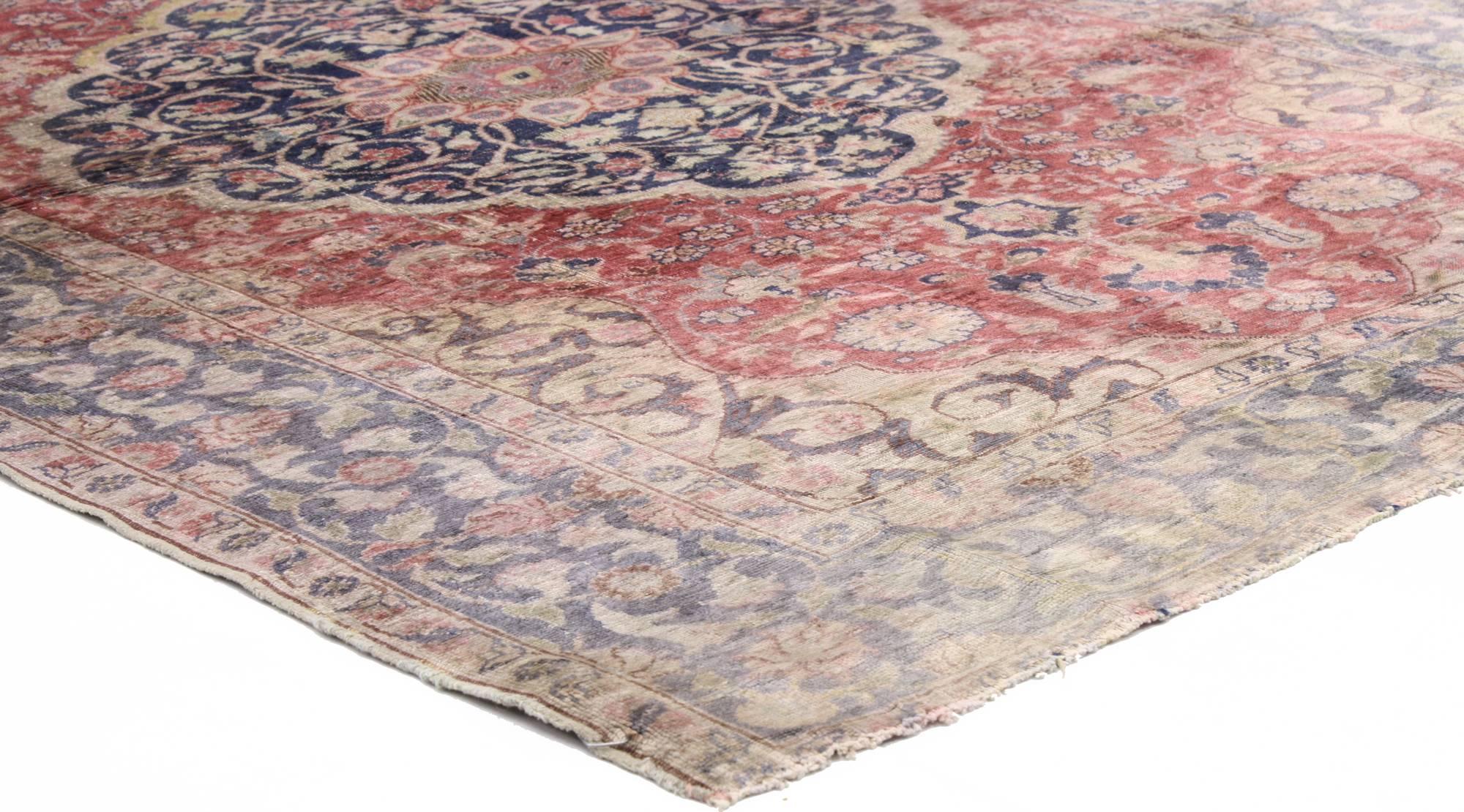 51168 distressed vintage Turkish Sivas rug with romantic English country style. This distressed vintage Turkish Sivas rug features a cussed center medallion anchored with pendant finials at either end. The medallion is surrounded by an array of