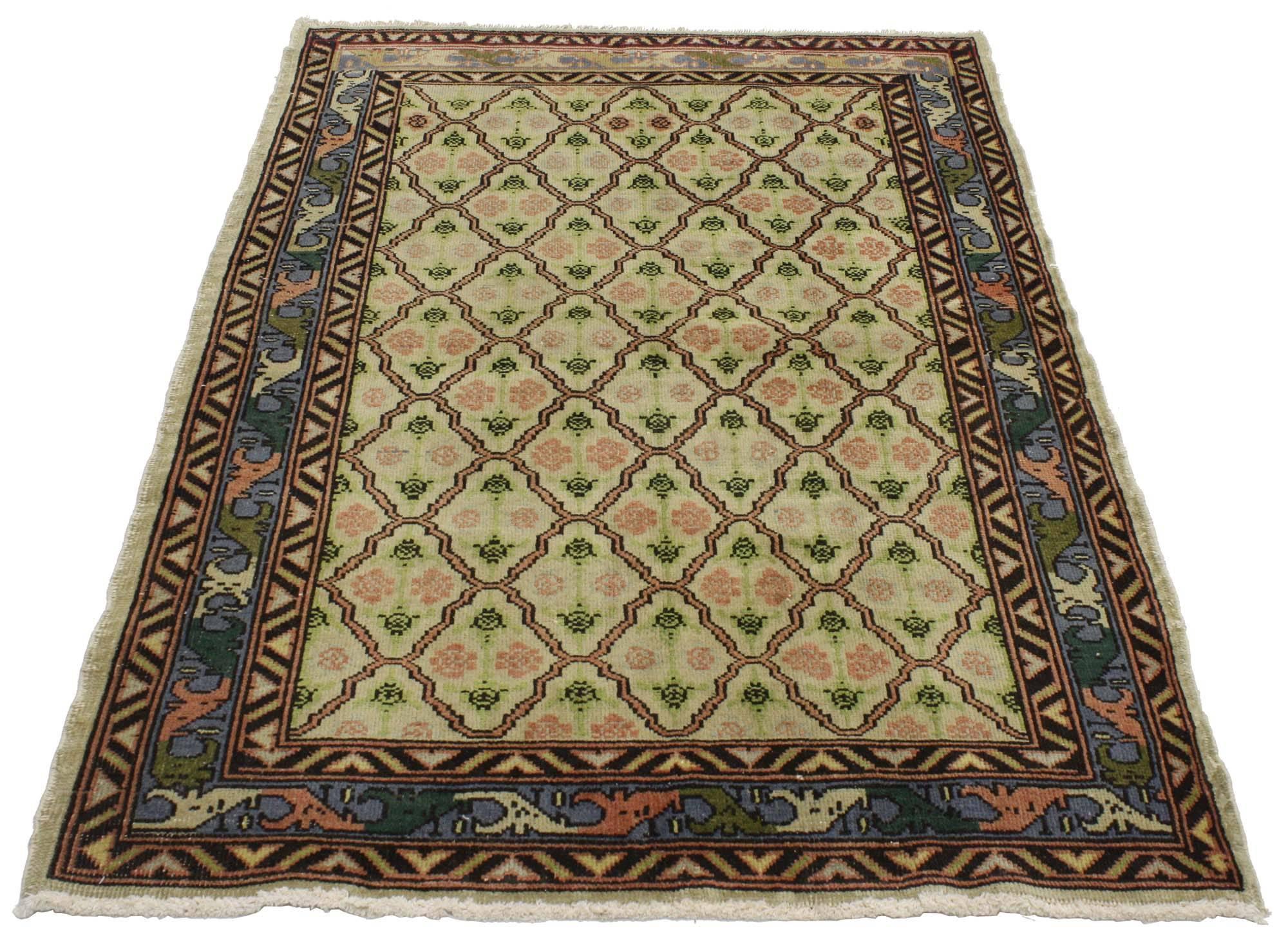 51897, Distressed Vintage Turkish Sivas Rug with Romantic Industrial Art Deco Style. This hand knotted wool distressed vintage Turkish Sivas rug with romantic Industrial style features a floral lattice pattern composed of scalloped diamonds in