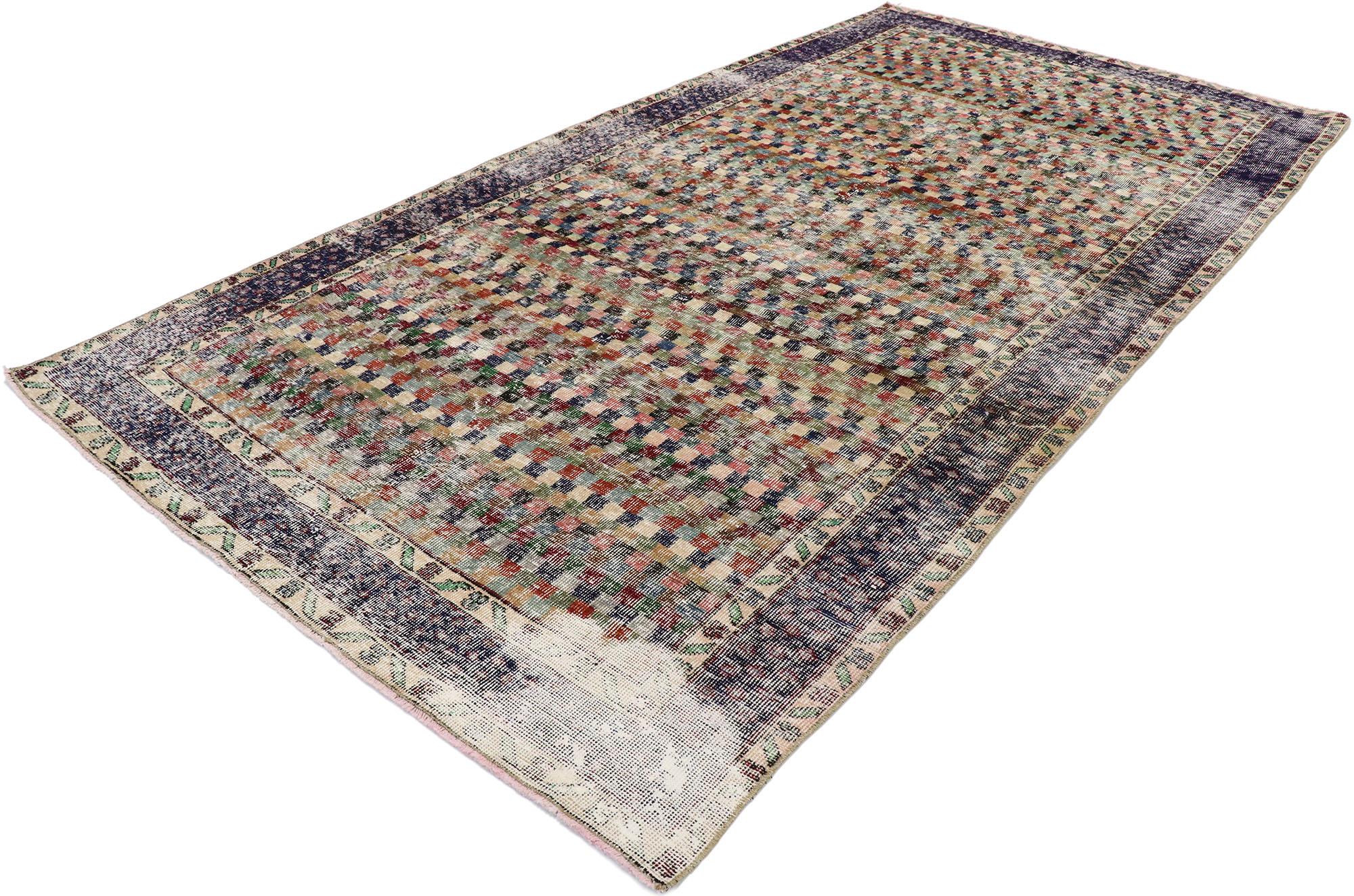 53311 Distressed Vintage Turkish Sivas Rug with Rustic Arts & Crafts Style. This hand knotted wool distressed vintage Turkish Sivas rug features an all-over checkered pattern comprised of multicolored cubes and squares. Gentle waves of abrash and