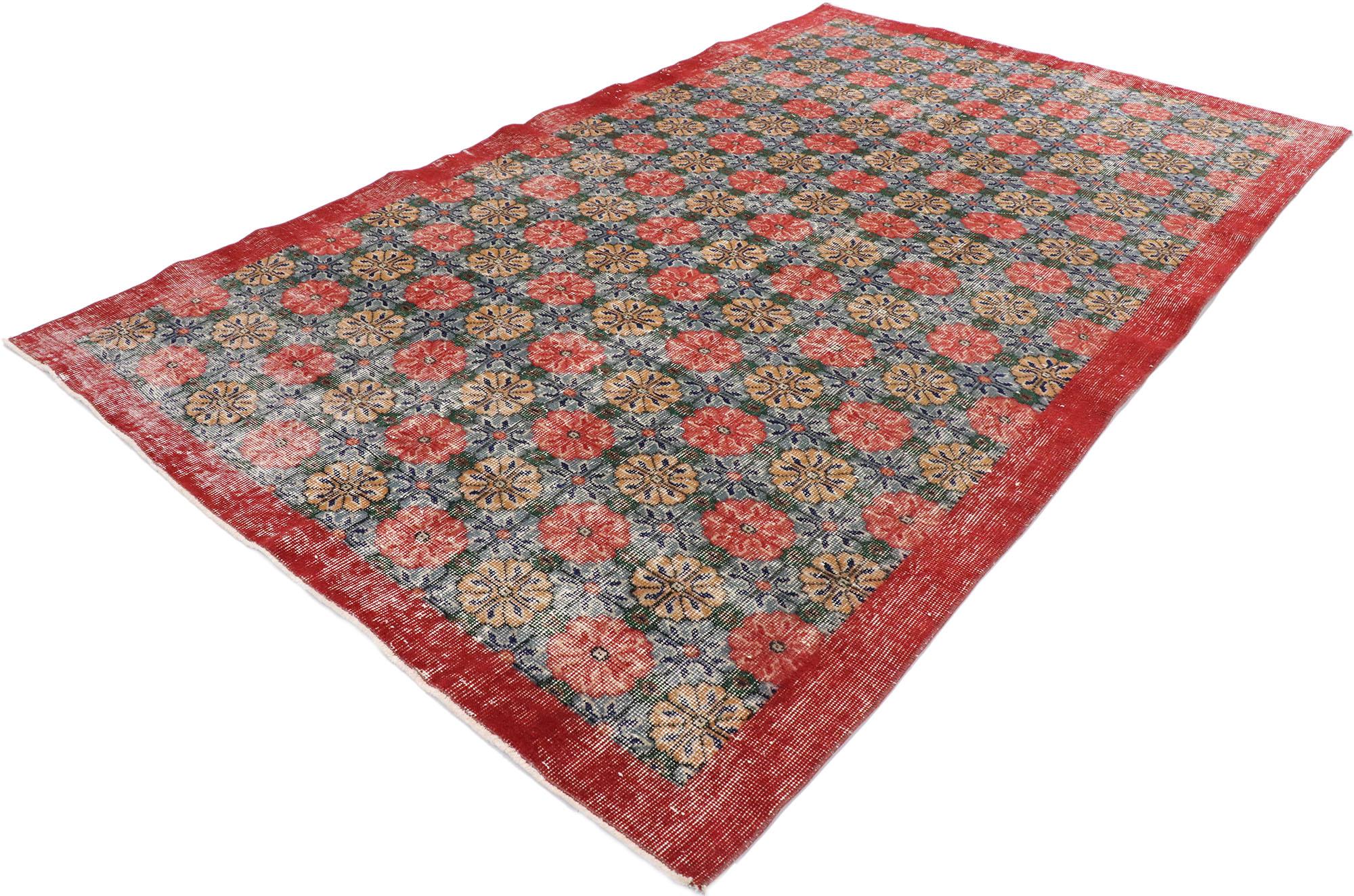 53375 distressed vintage Turkish Sivas rug with Rustic Arts & Crafts style. This hand knotted wool distressed vintage Turkish Sivas rug features a polychromatic all-over floral pattern comprised of offset rows of open blossoms. Gentle waves of