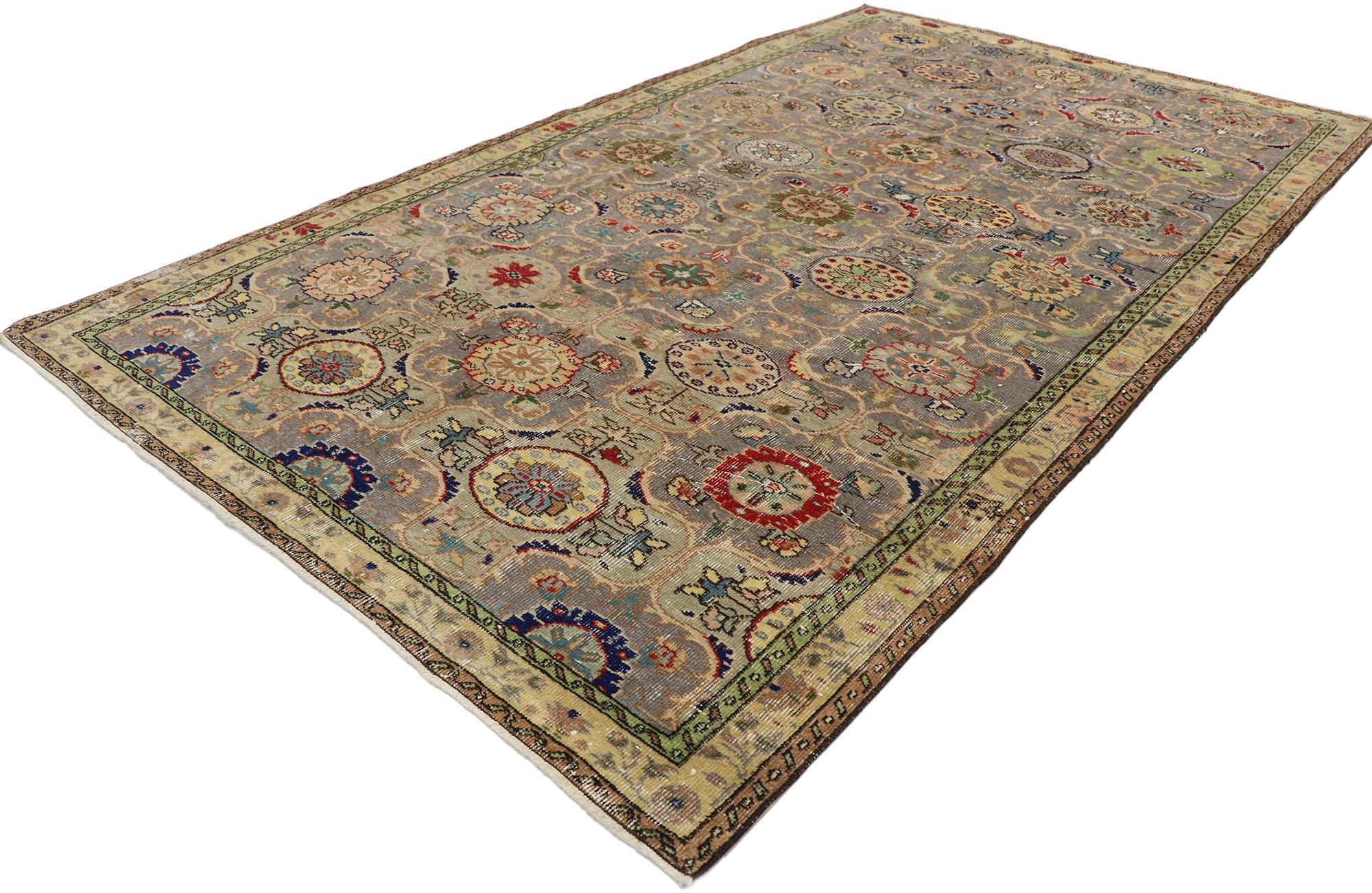 53230, distressed vintage Turkish Sivas rug with Rustic Craftsman style. Striking the perfect balance of rustic sensibility and understated elegance, this hand knotted wool vintage Turkish Sivas rug charms with ease. The lovingly time-worn field