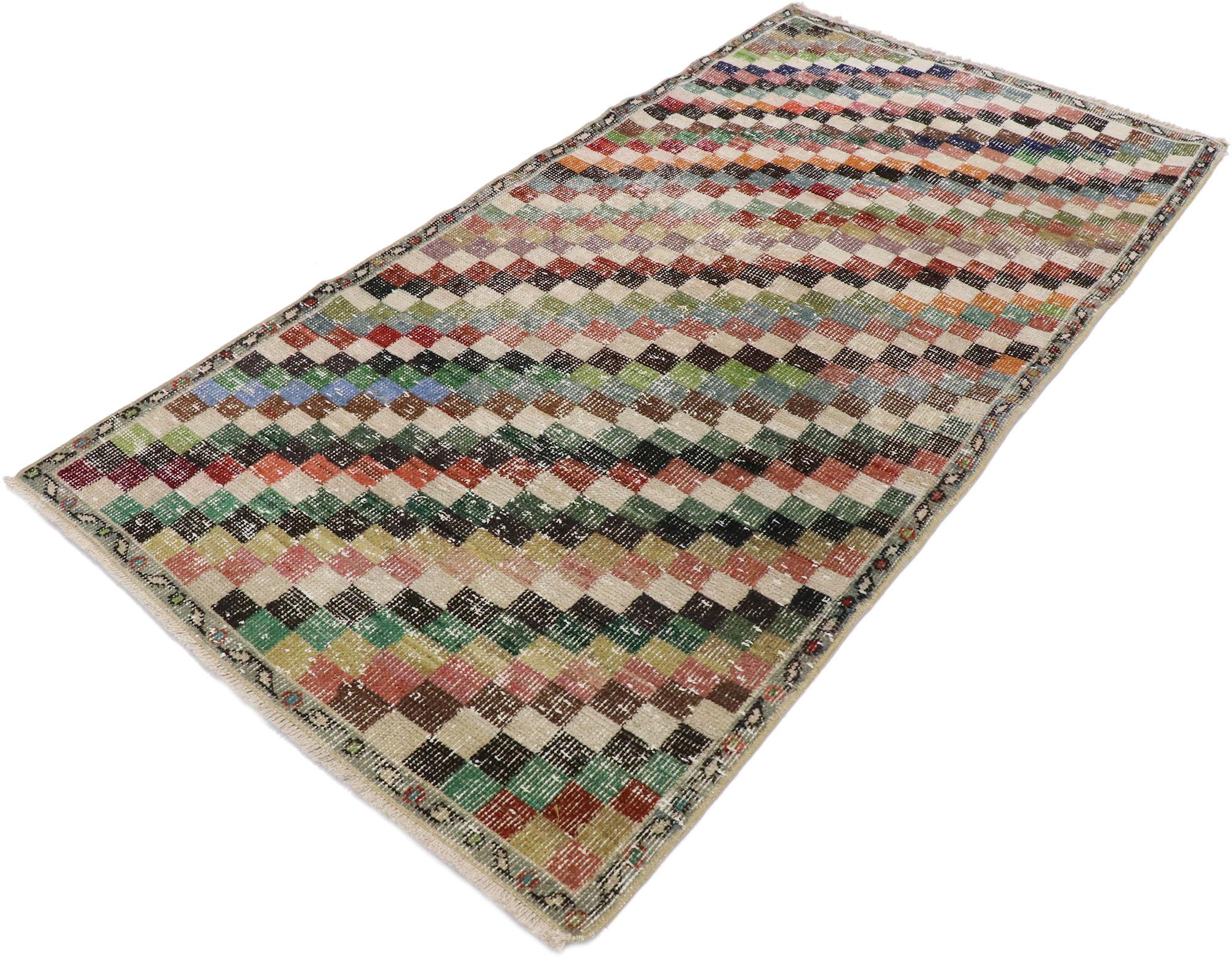 53338, Distressed Vintage Turkish Sivas Rug with Rustic Cubist Style. This hand knotted wool distressed vintage Turkish Sivas rug features an all-over checkered diagonal stripe pattern comprised of rows of multicolored diamonds. Each row of diamonds