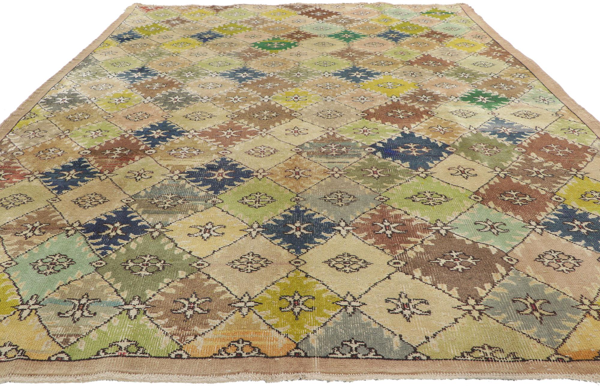 20th Century Distressed Vintage Turkish Sivas Rug with Rustic Earth-Tone Colors For Sale