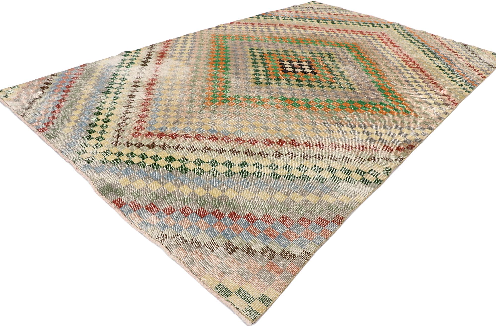 53337, distressed vintage Turkish Sivas rug with Rustic Mid-Century Modern Cubist style. This hand knotted wool distressed vintage Turkish Sivas rug features an all-over checkered diamond pattern comprised of rows of multicolored cubes. Each row of