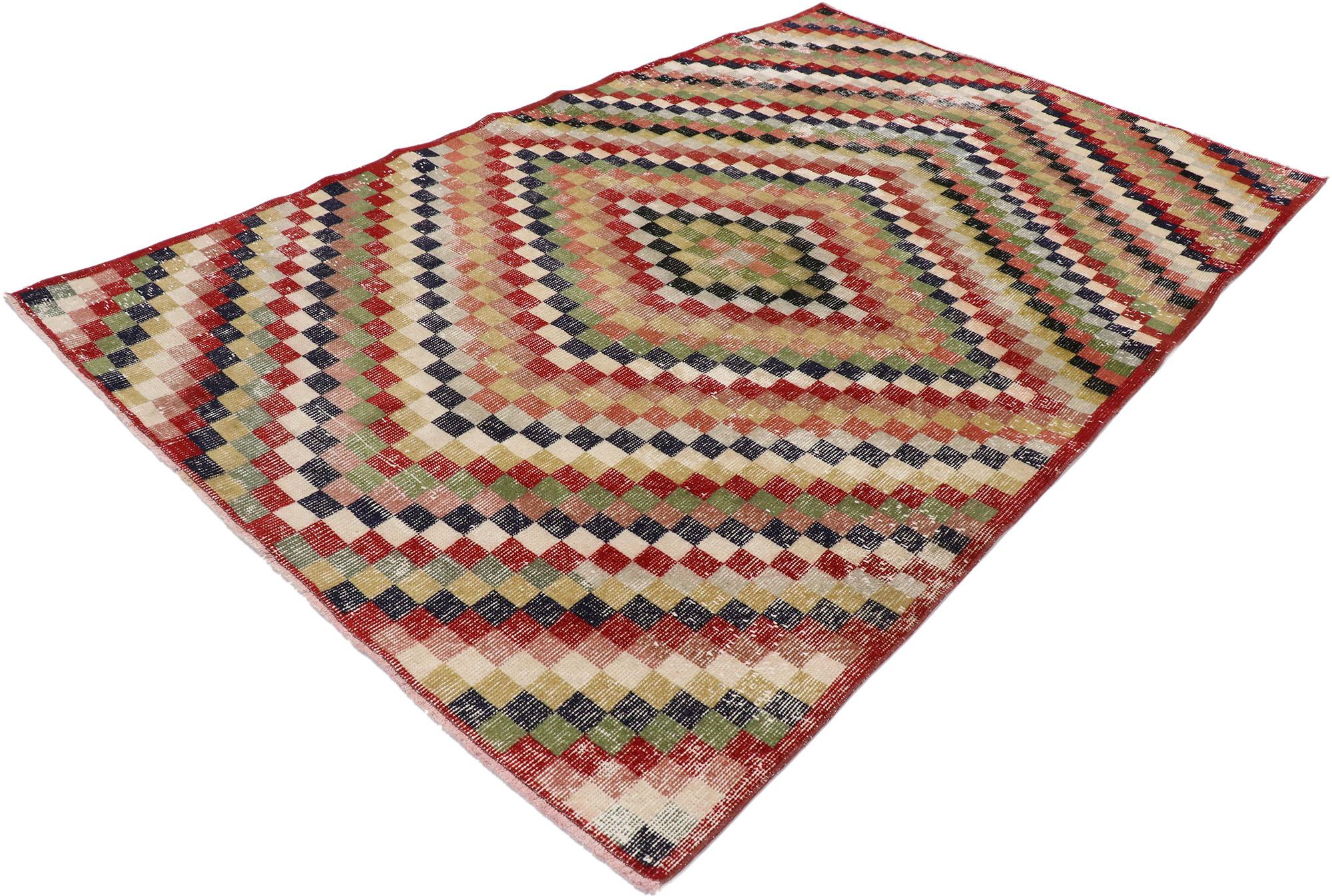 53323, distressed vintage Turkish Sivas rug with rustic Mid-Century Modern Cubist style. This hand knotted wool distressed vintage Turkish Sivas rug features an all-over checkered diamond pattern comprised of rows of multicolored cubes. Each row of