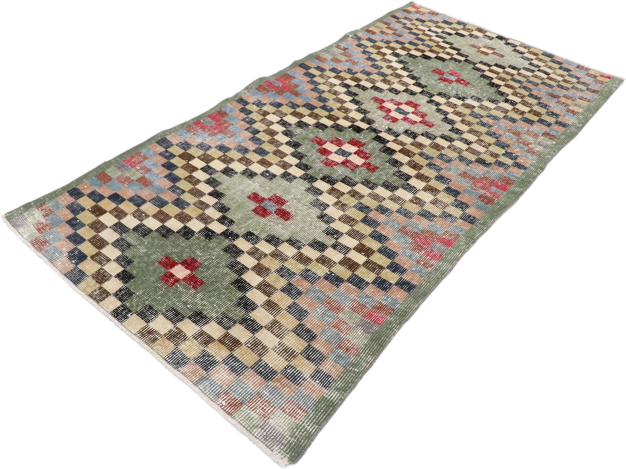 53317, distressed vintage Turkish Sivas rug with rustic Mid-Century Modern Cubist style. This hand knotted wool distressed vintage Turkish Sivas rug features an all-over checkered stacked diamond pattern comprised of rows of multicolored cubes. Each