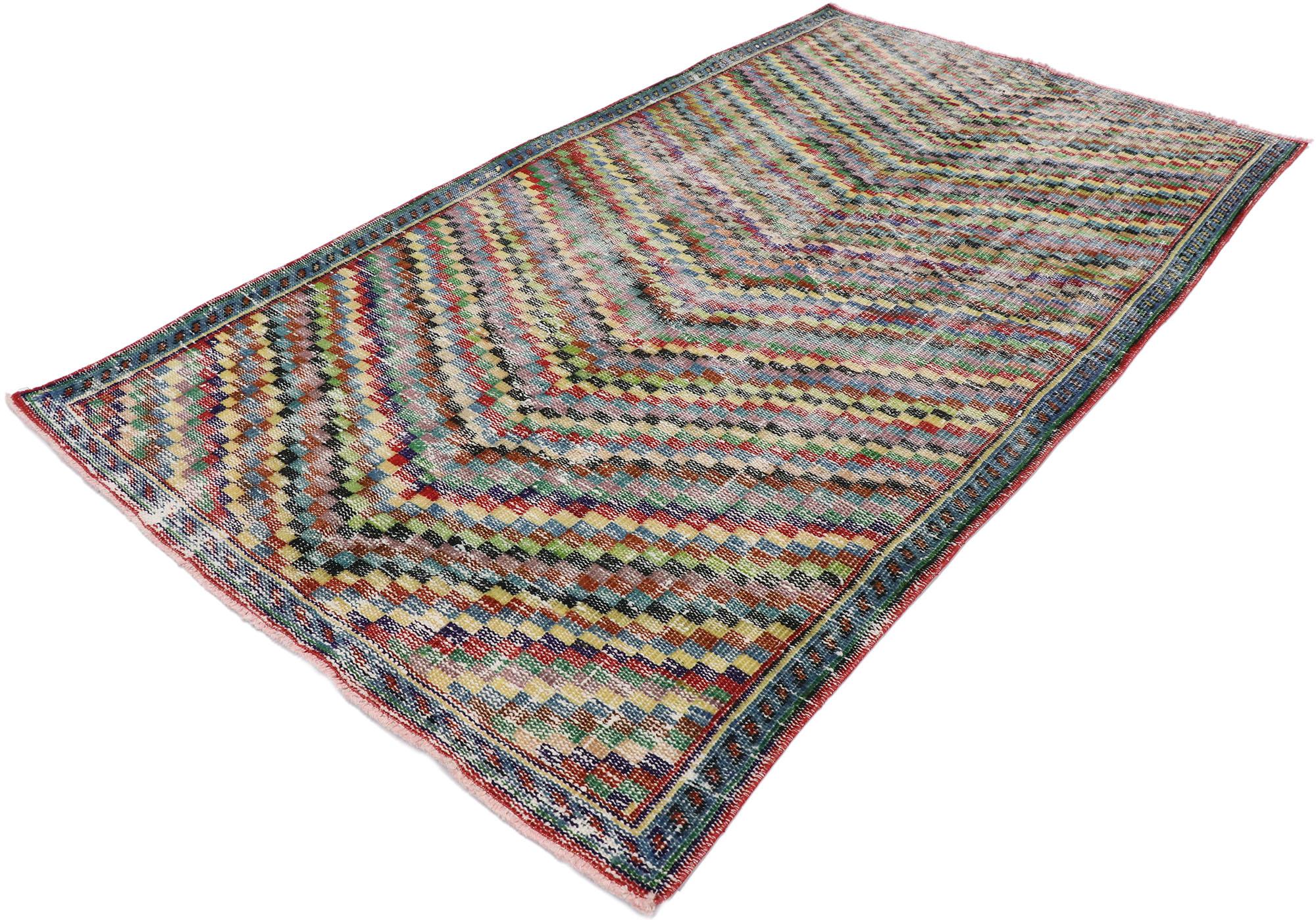 53301, distressed vintage Turkish Sivas rug with Rustic Mid-Century Modern Cubist style. This hand knotted wool distressed vintage Turkish Sivas rug features an all-over checkered chevron pattern comprised of rows of multicolored squares. Each row