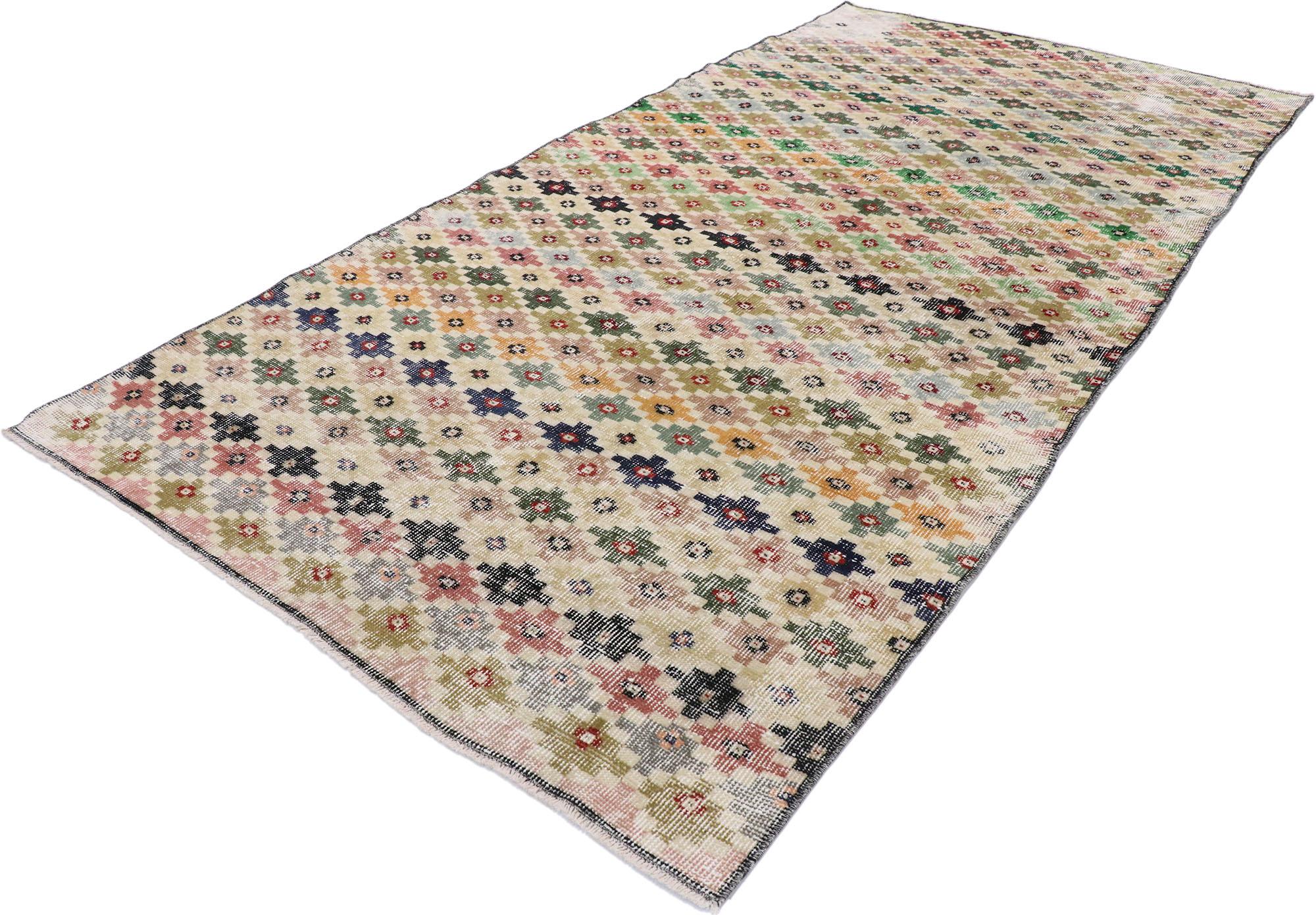 53291, distressed vintage Turkish Sivas rug with Rustic Mid-Century Modern style. This hand knotted wool distressed vintage Turkish Sivas rug features an all-over repeating pattern comprised of multicolored concentric stepped star motifs. Gentle