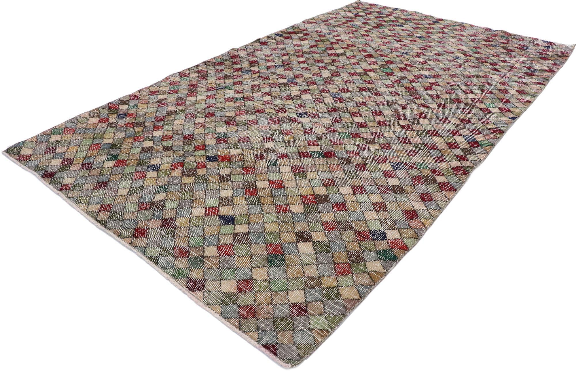 53290, distressed vintage Turkish Sivas rug with Rustic Mid-Century Modern style. This hand knotted wool distressed vintage Turkish Sivas rug features an all-over checkerboard pattern comprised of multicolored diamonds. Gentle waves of Abrash and