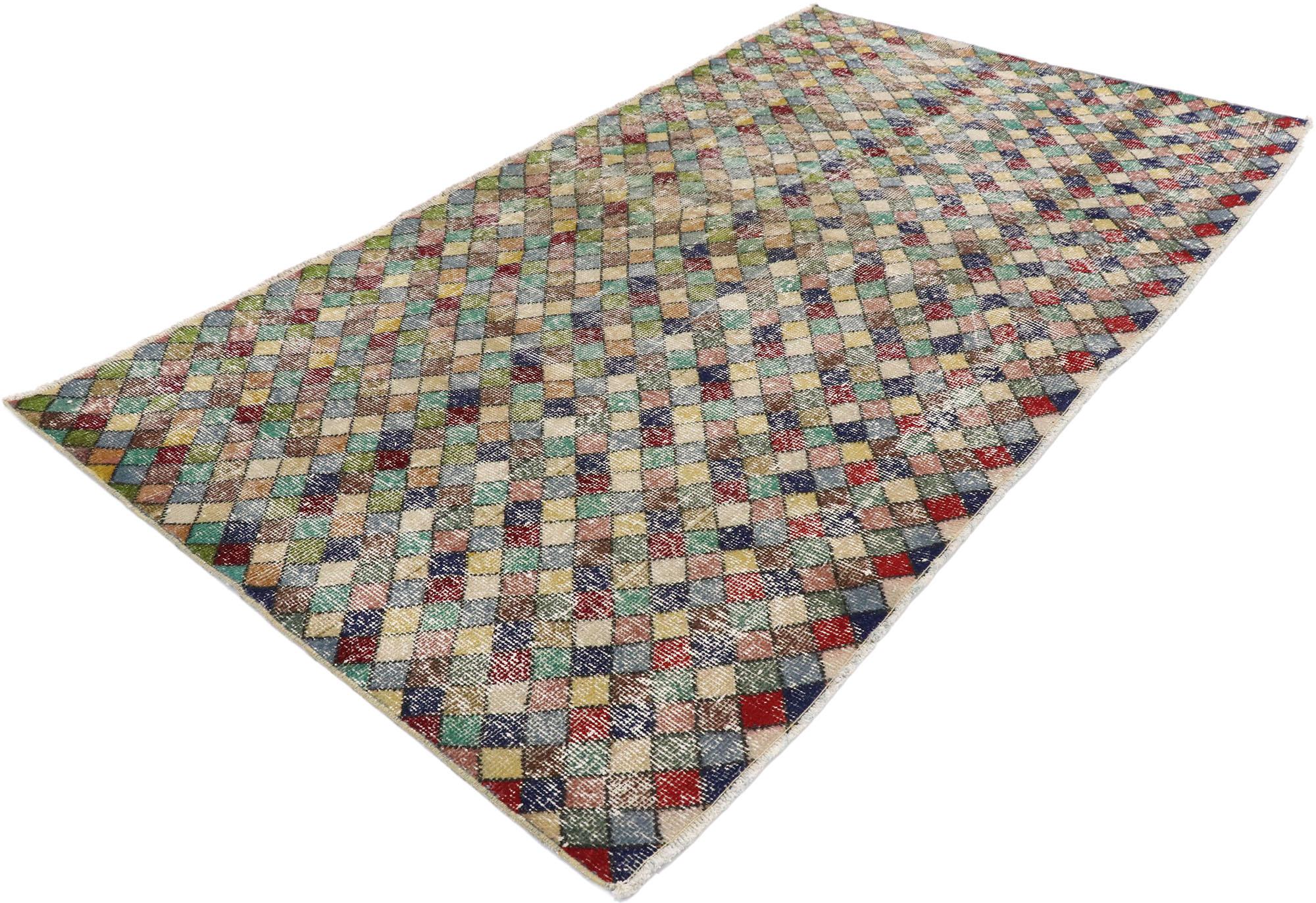 53282 distressed vintage Turkish Sivas rug with Rustic Mid-Century Modern style. This hand knotted wool distressed vintage Turkish Sivas rug features an all-over checkerboard pattern comprised of multicolored diamonds. Gentle waves of abrash and
