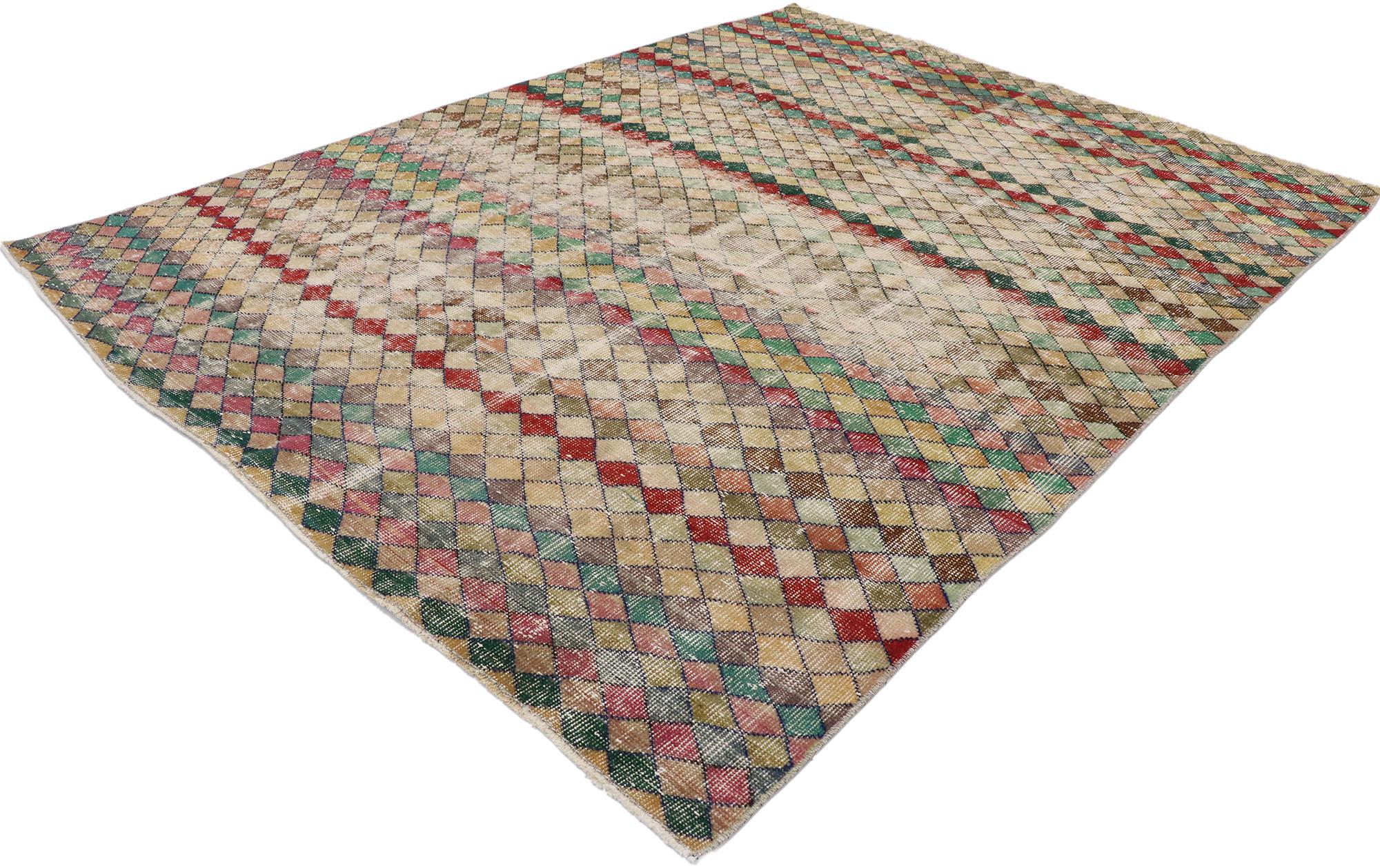 53322, distressed vintage Turkish Sivas rug with Rustic Mid-Century Modern style. This hand knotted wool distressed vintage Turkish Sivas rug features an all-over checkerboard pattern comprised of multicolored diamonds. Gentle waves of abrash and