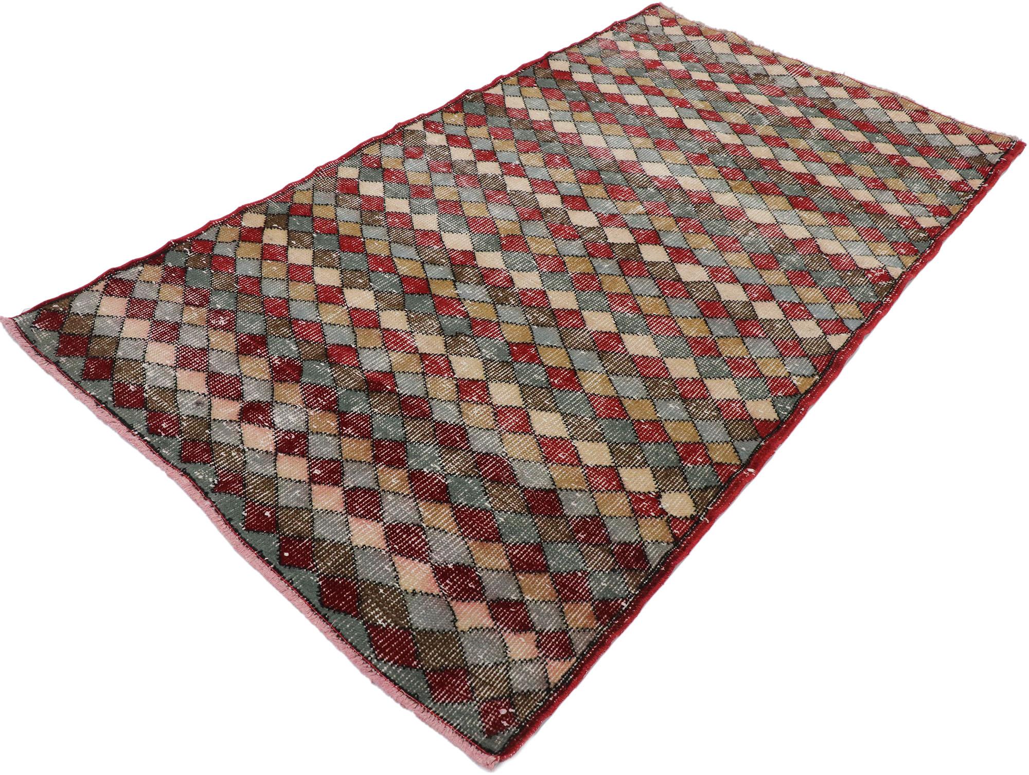 53321 distressed vintage Turkish Sivas rug with rustic Mid-Century Modern style. This hand knotted wool distressed vintage Turkish Sivas rug features an all-over checkered stripe pattern comprised of rows of multi-colored diamonds. Each row of