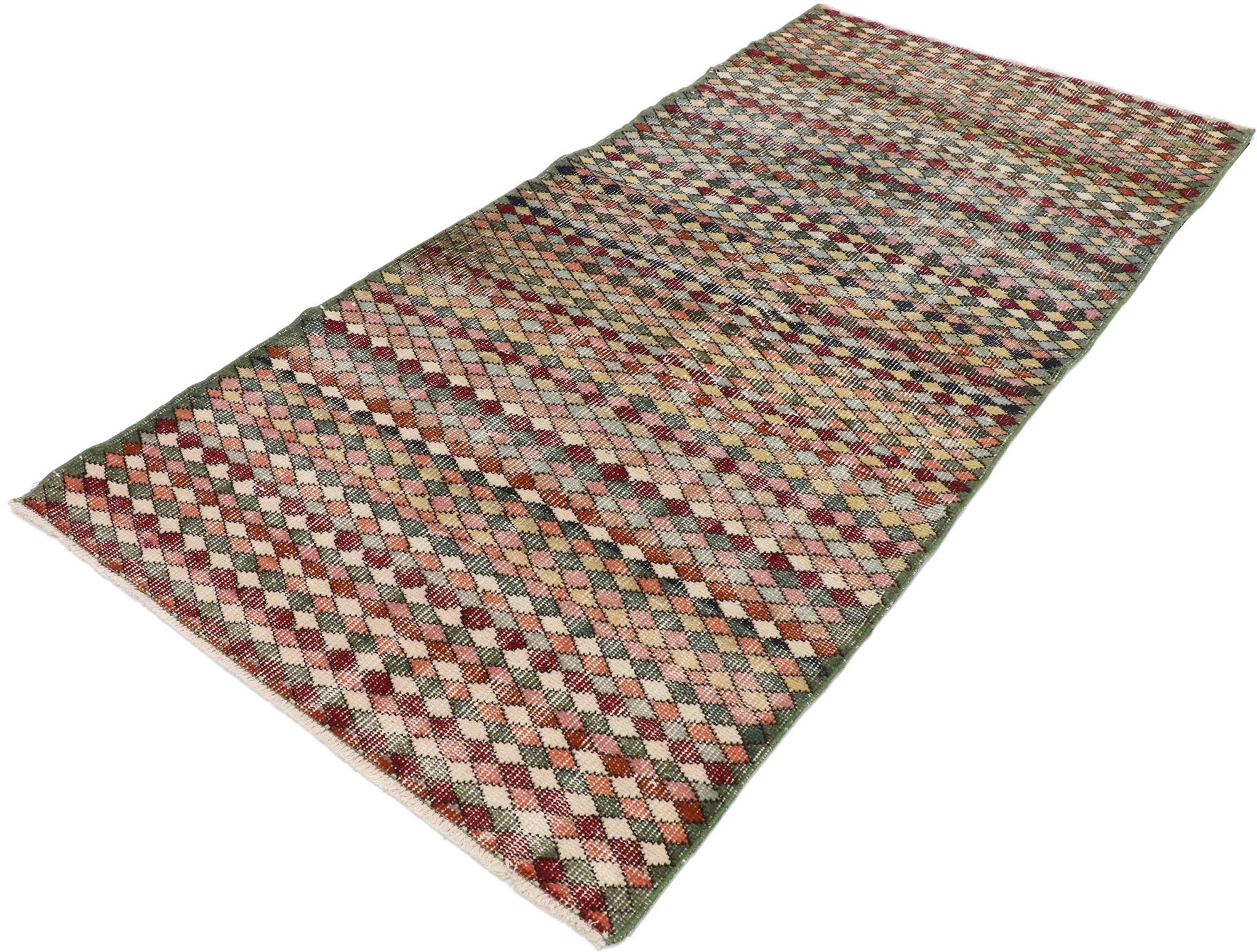 53371, distressed vintage Turkish Sivas rug with Rustic Mid-Century Modern style. This hand knotted wool distressed vintage Turkish Sivas rug features an all-over geometric pattern comprised of multicolored diamonds. Gentle waves of abrash and