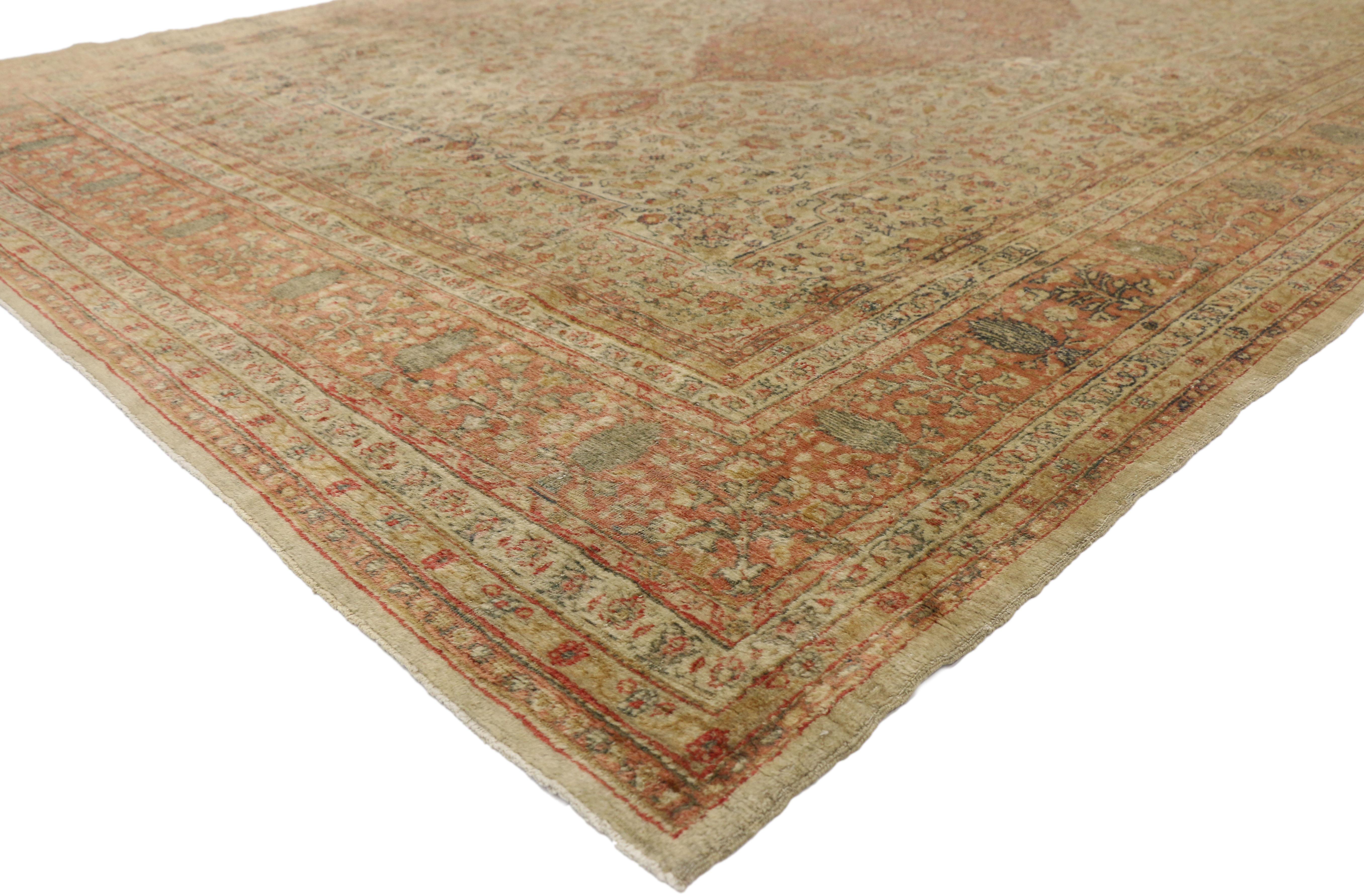 77293 Distressed Vintage Turkish Sivas Rug with Rustic Northwestern Artisan Style. This hand knotted wool distressed vintage Turkish Sivas rug features a cusped oval medallion anchored with palmette finials at either end. The central medallion is