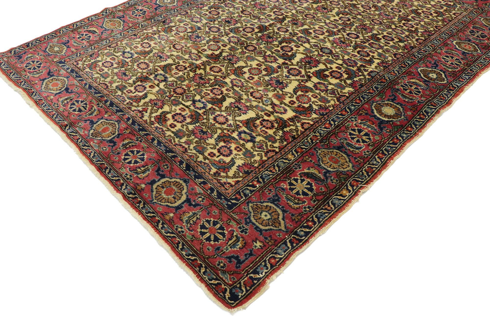 53068, distressed vintage Turkish Sivas rug with Rustic Victorian style. Rich in color with beguiling beauty, this hand knotted wool distressed vintage Turkish Sivas rug beautifully embodies rustic Victorian style. The lovingly time-worn beige field