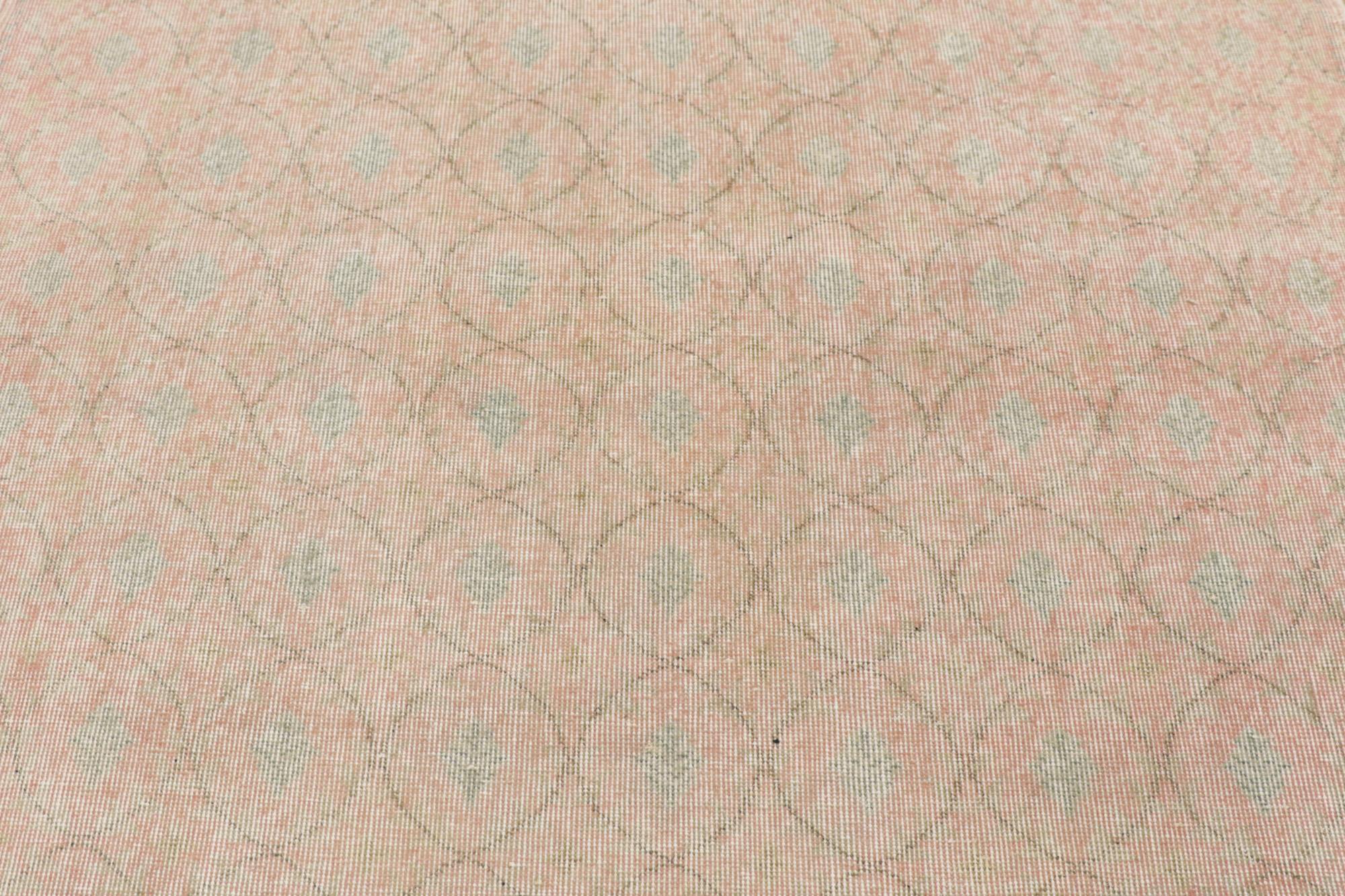 Hand-Knotted Distressed Soft Pink Vintage Turkish Sivas Rug For Sale