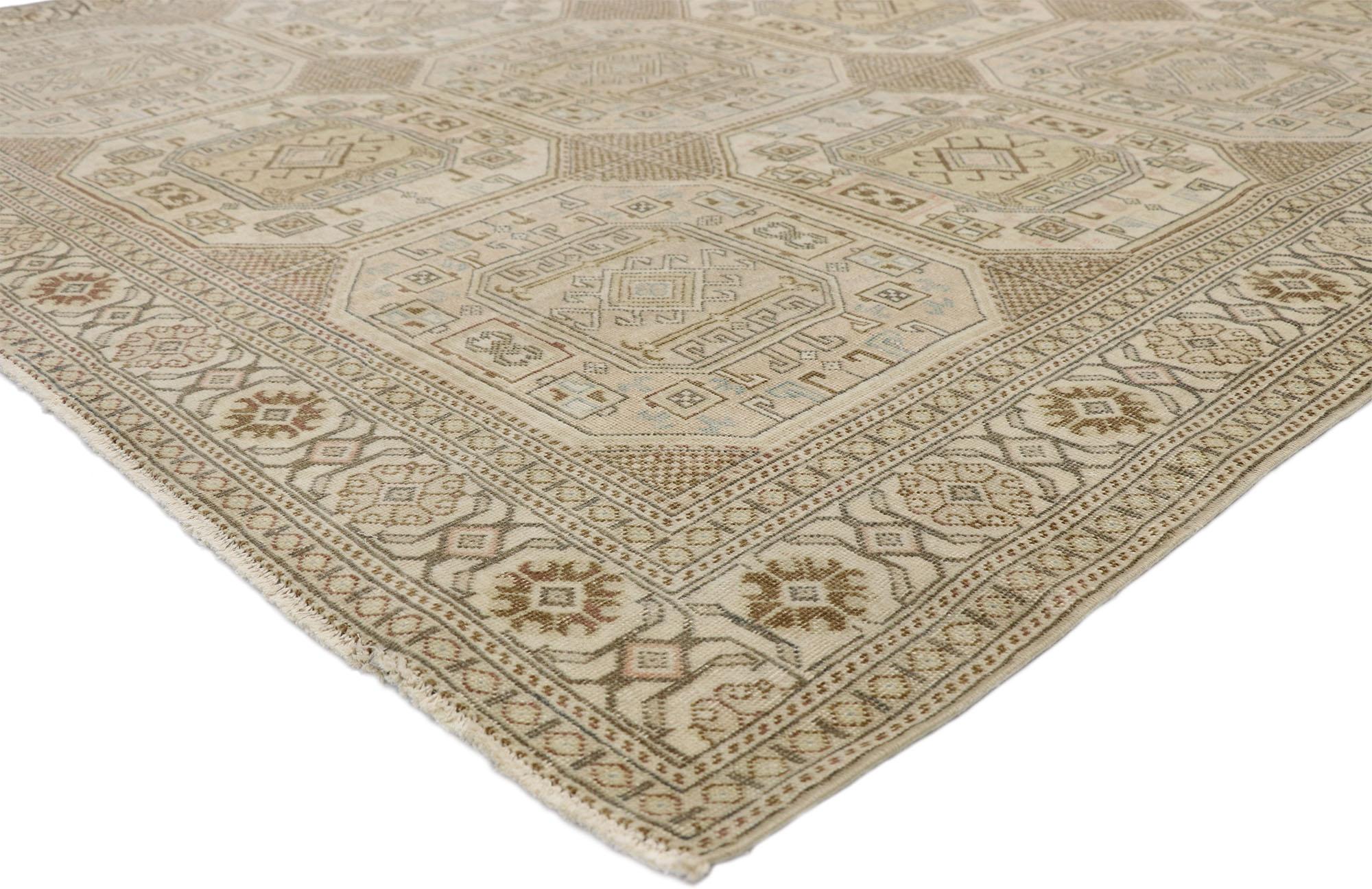 52658 Distressed Vintage Turkish Sivas Rug with Tekke Turkmen Design. Displaying nomadic charm and modern style, this hand knotted wool distressed vintage Turkish Sivas rug is an amalgam of Tekke Turkmen influence. It features a geometric pattern