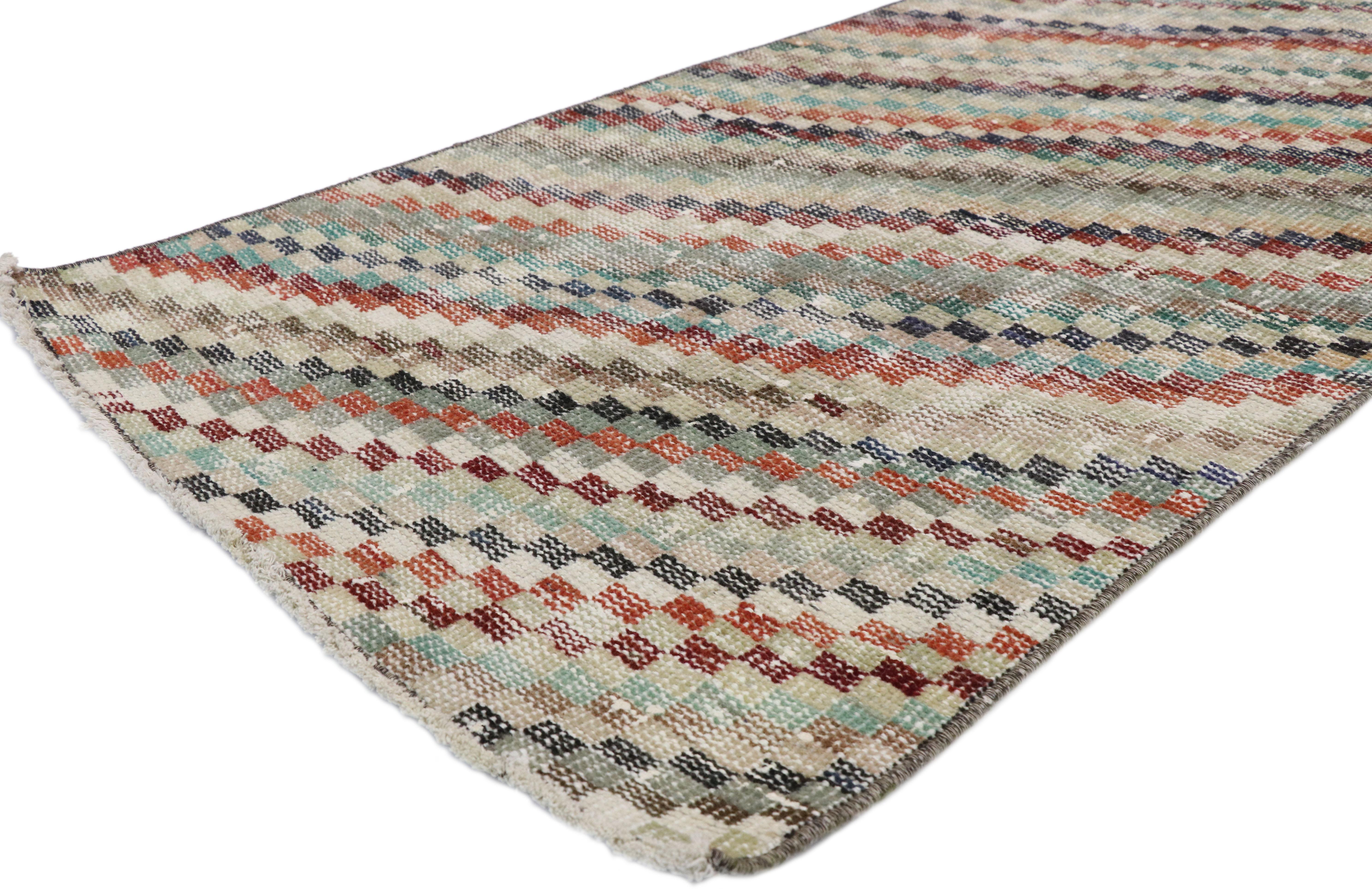 52193 Distressed Vintage Turkish Sivas Runner with Art Deco Style, Narrow Runner. Warm and inviting combined with a bold pattern, this hand knotted wool distressed vintage Turkish Sivas rug embodies bold Art Deco style with a modern artisan twist.
