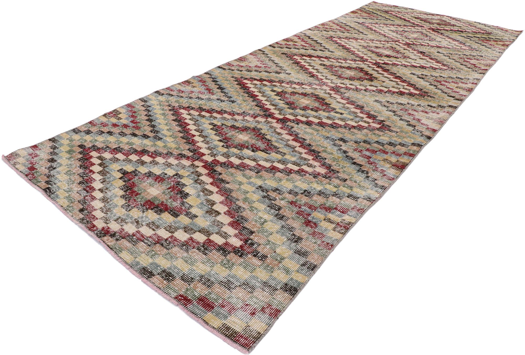 53362 distressed vintage Turkish Sivas runner with Mid-Century Modern Rustic style. This hand knotted wool distressed vintage Turkish Sivas rug features an all-over checkered diamond pattern comprised of rows of multicolored cubes. Each row of