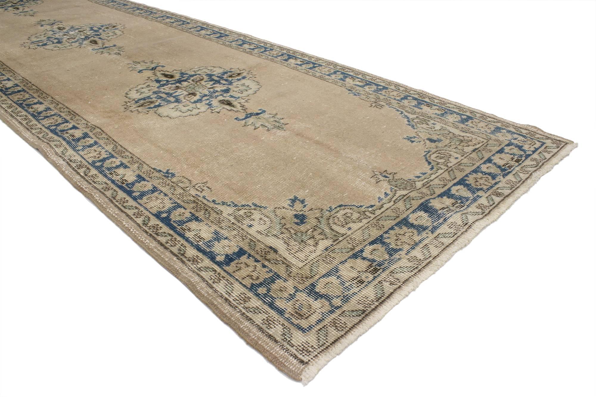 52118 Distressed Vintage Turkish Sivas Runner with Gustavian Farmhouse Style. This hand-knotted wool distressed vintage Turkish Sivas runner features three stylized medallions patterned and anchored with blooming palmettes. It is framed with