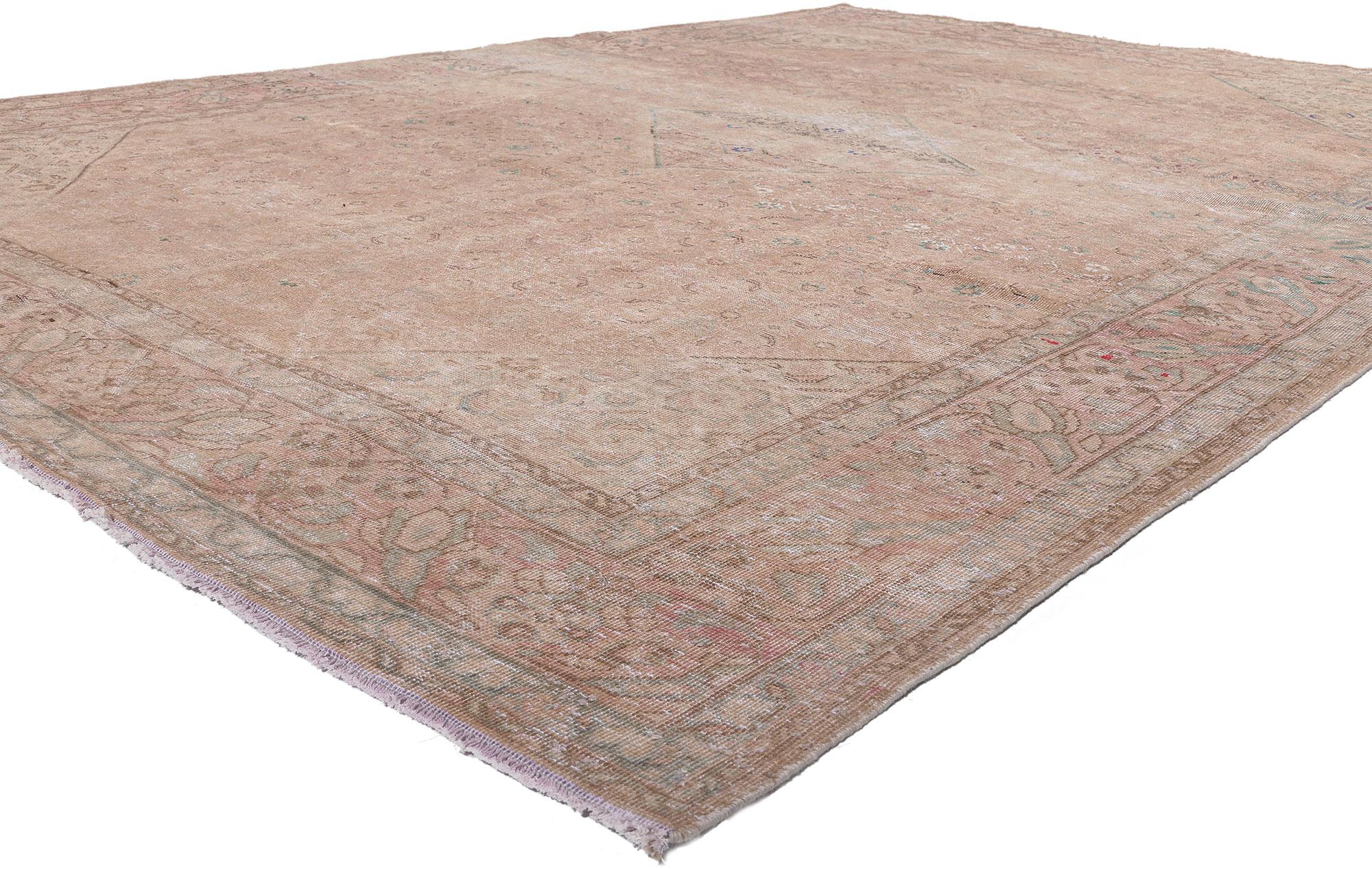 61248 Distressed Antique Persian Mahal Rug, 08'04 x 12'03. This hand-knotted wool antique Persian Mahal rug is a captivating embodiment of refined elegance and rustic charm. Its allover pattern of Herati motifs gracefully adorns the soft brown,