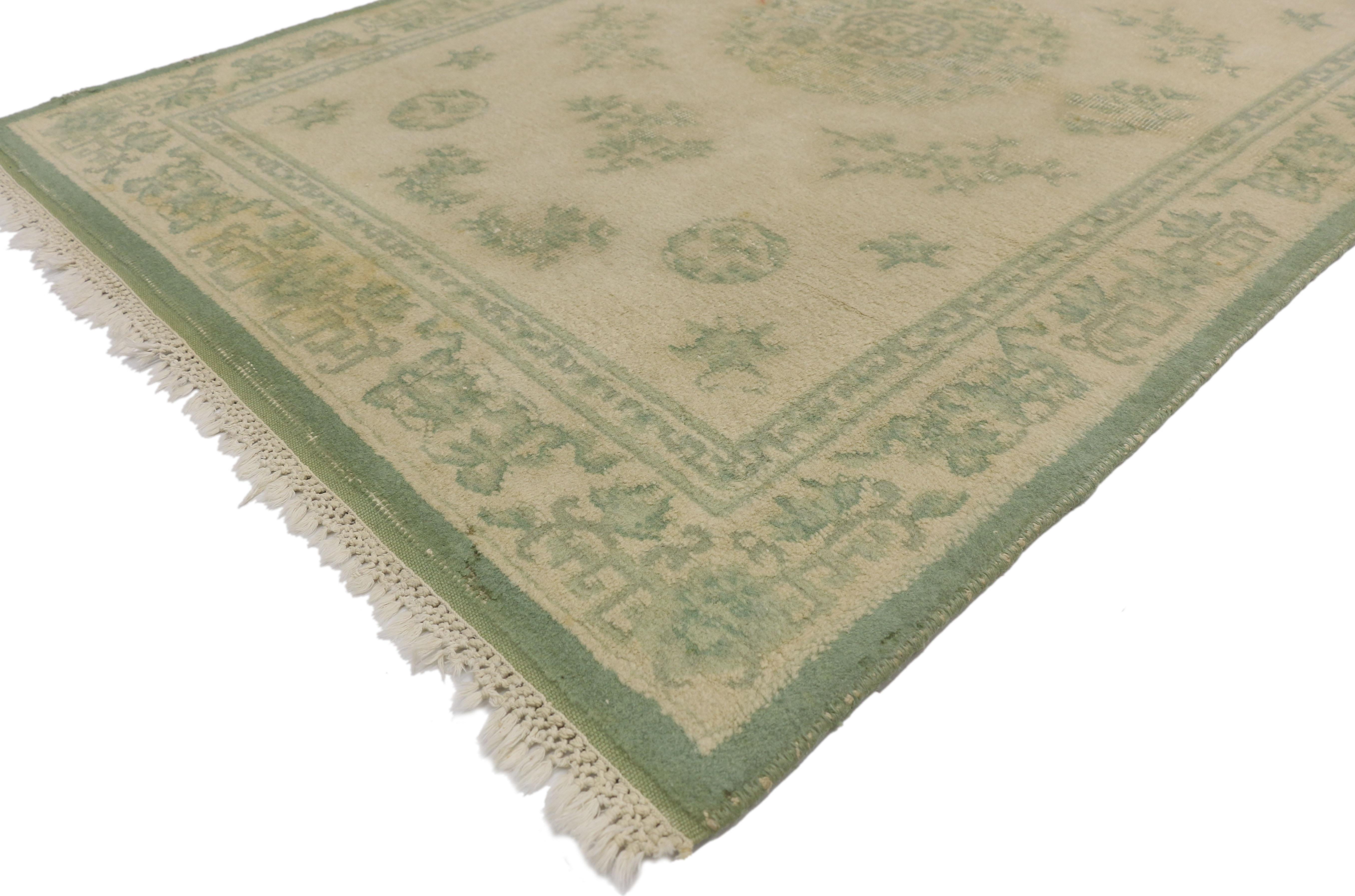 74742 Distressed Weathered Vintage Indian Rug with Chinoiserie Shabby Chic Style 03'11 x 06'00. Versatility and high end style collide in this beautifully worn and well loved vintage Indian rug. Elegantly designed and timelessly weathered, this