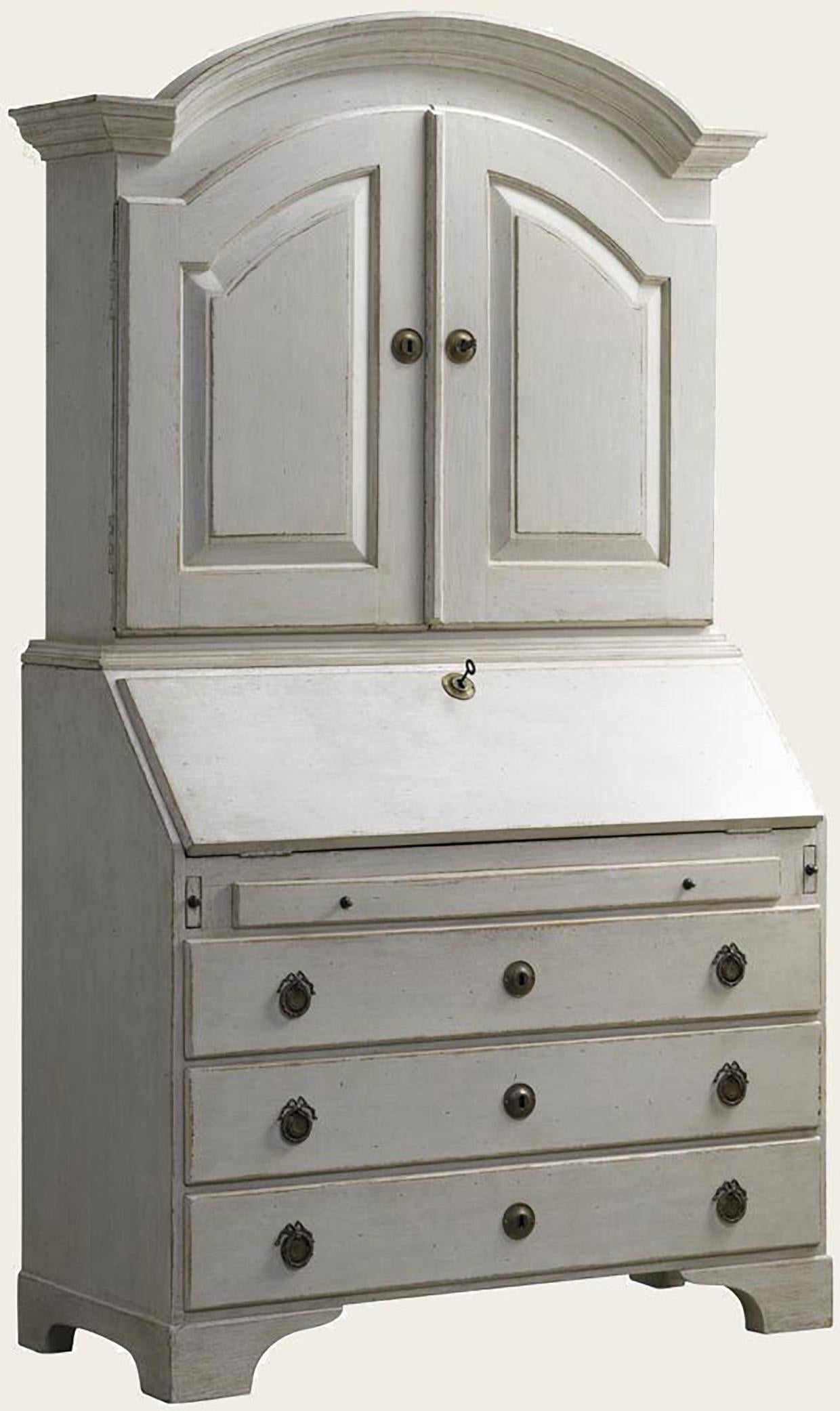 Distressed white painted Gustavian style bureau - secretaire. Hand carved and hand painted adds warmth to any room with it's great dimensions and country style coloring. Three shelves, numerous small drawers in the bureau bottom-half and larger
