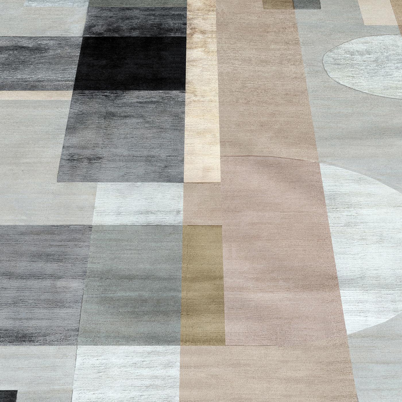 Knotted in Nepal by the expert hands of local master craftsmen, this rug celebrates the alluring rigor of avant-garde art, which had as a reference point the Bauhaus School. Its striking silhouette composed of 50% silk and 50% Himalayan wool