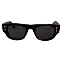 Lunettes de soleil DITA en acétate noir et or