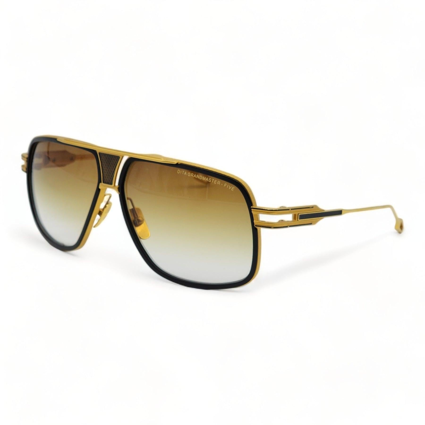 A Dita best seller, the Grandmaster 5 series.

Additional information:
Material: Titanium
Color: Gold
Country: Handmade in Japan
Dimension: 64mm (lens) - 13mm (bridge) - 130mm (temple). 
Condition: Fair condition with screw missing. Normal signs of