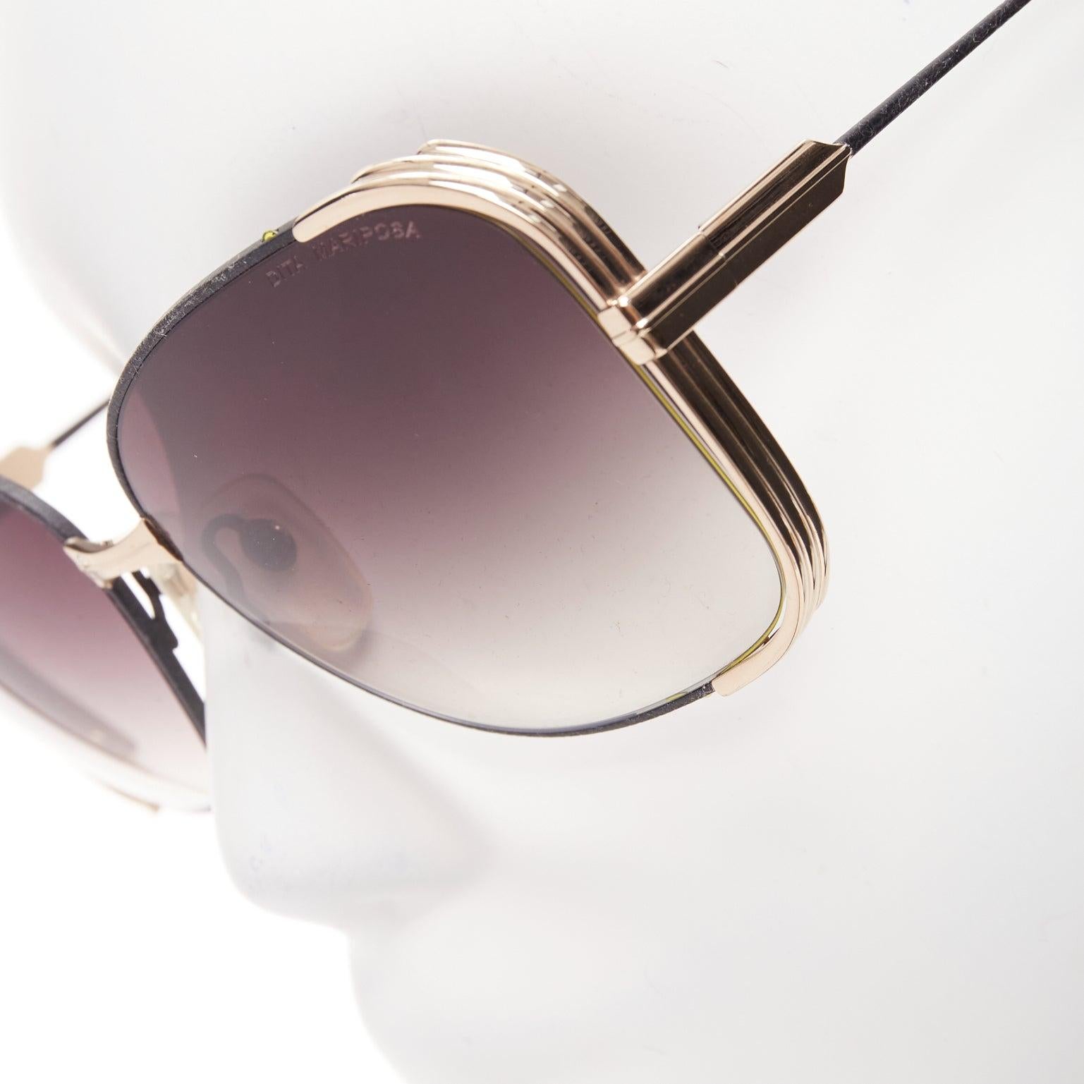 DITA Mariposa black gold metallic sides frame logo end butterfly sunnies
Reference: AAWC/A01014
Brand: Dita
Model: Mariposa
Material: Metal, Leather
Color: Black, Gold
Pattern: Solid
Lining: Black Leather
Extra Details: Black leather arms and