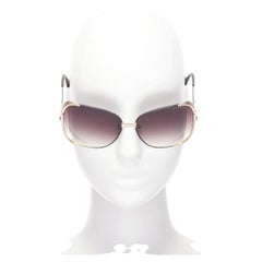 DITA Mariposa black gold metallic sides frame logo end butterfly sunnies