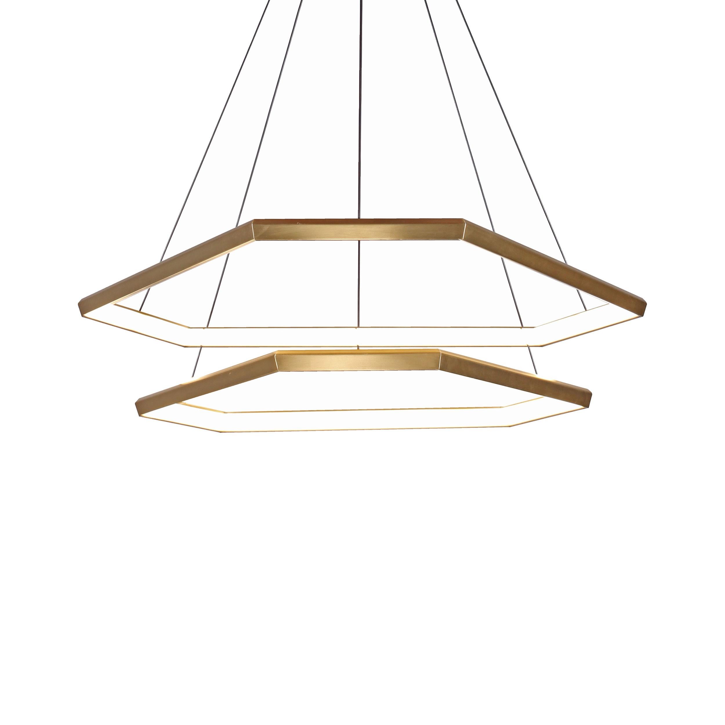 DITRI takes the form of a sleek ditrigon, a blend between a convex hexagon and a triangle. This line was inspired by the flawless natural form of a unique type of snowflake. This double tiered fixture is a natural volumetric progression of the DITRI