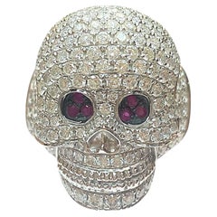 Anello teschio con diamante e rubino in oro bianco 18 carati DIVA