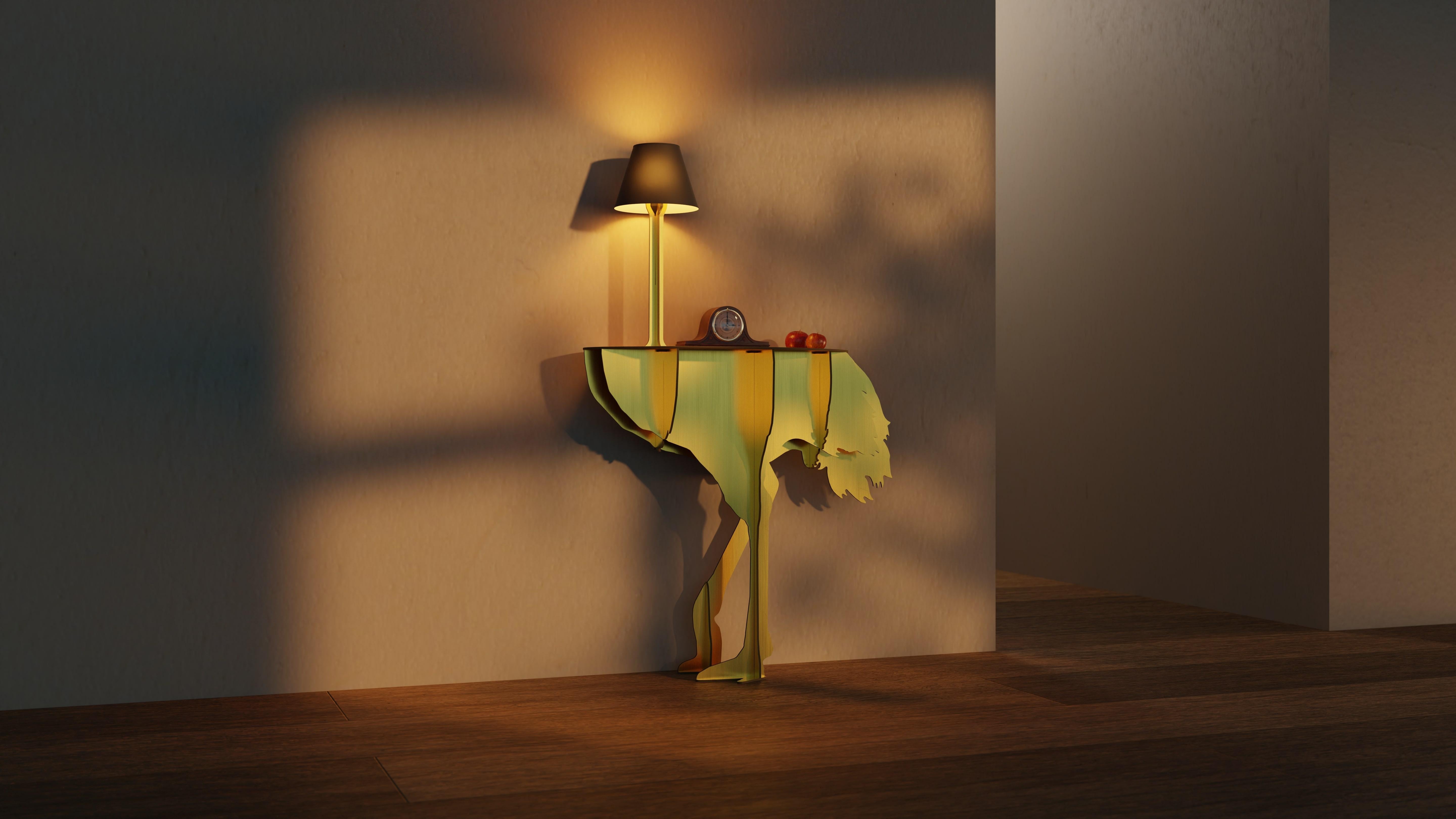 Graceful and airy, the ostrich Diva Lucia seems ready to take off in a wild race, defying gravity with its two feet barely anchored to the ground.
Designed to lean against the wall and equipped with a lamp, this illuminated, ornamental, and