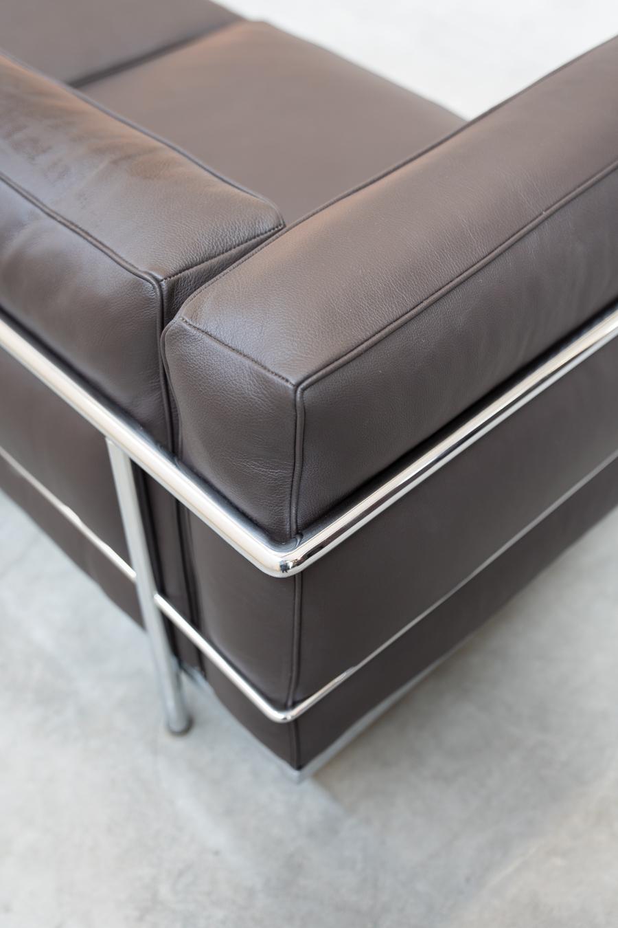 Sofa 2 seat  LC3 by Le Corbusier, Pierre Jenneret and Charlotte Perriand, for Cassina, 1990
Dark brown leather, chrome iron frame and black leather cushions with removable covers. With a modernist design, it is the epitome of timeless elegance and