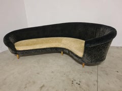 Curved sofa by Federico Munari
