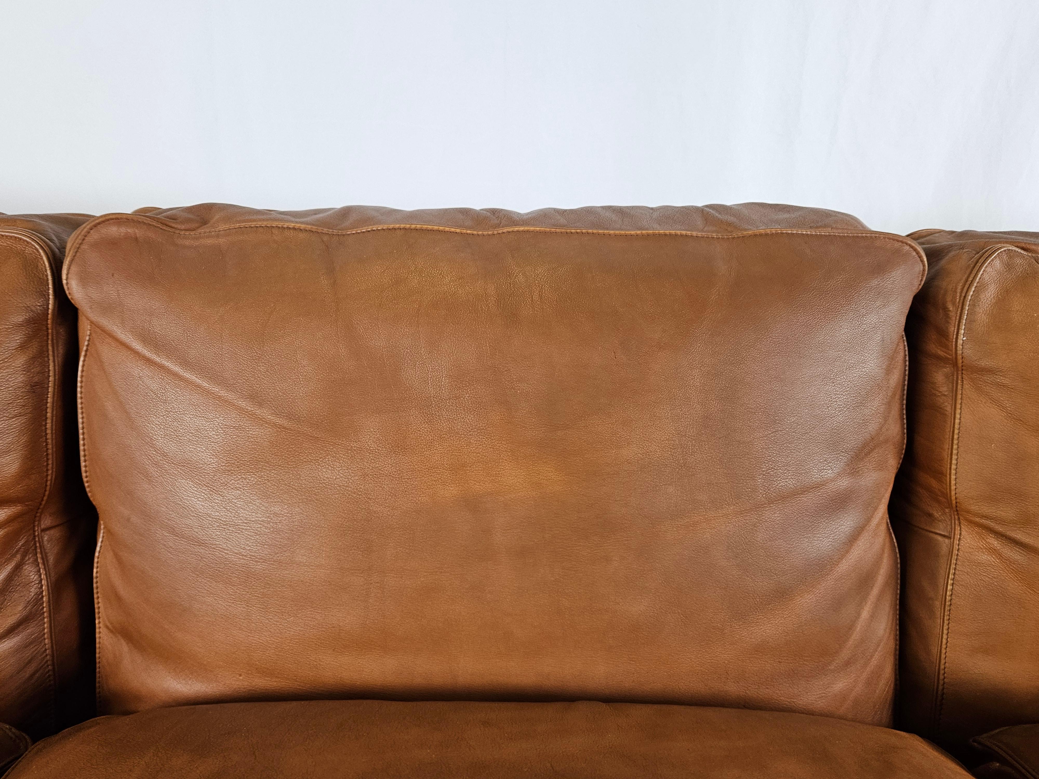 Late 20th Century Poltrona Frau three-seater 1970s sofa in cognac-colored leather For Sale